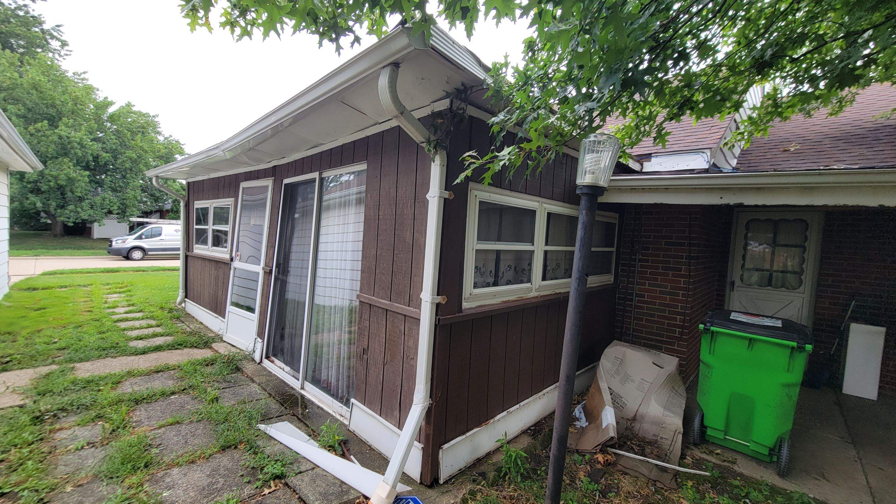 Tree Destroyed Patio Room by Absolute Roofing and Construction