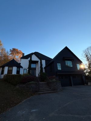 Bold Siding transformation with Cert Cedar Board & Batten S12, White, and Cert Monogram D/4 x 12'6" clapboard, Tuxedo