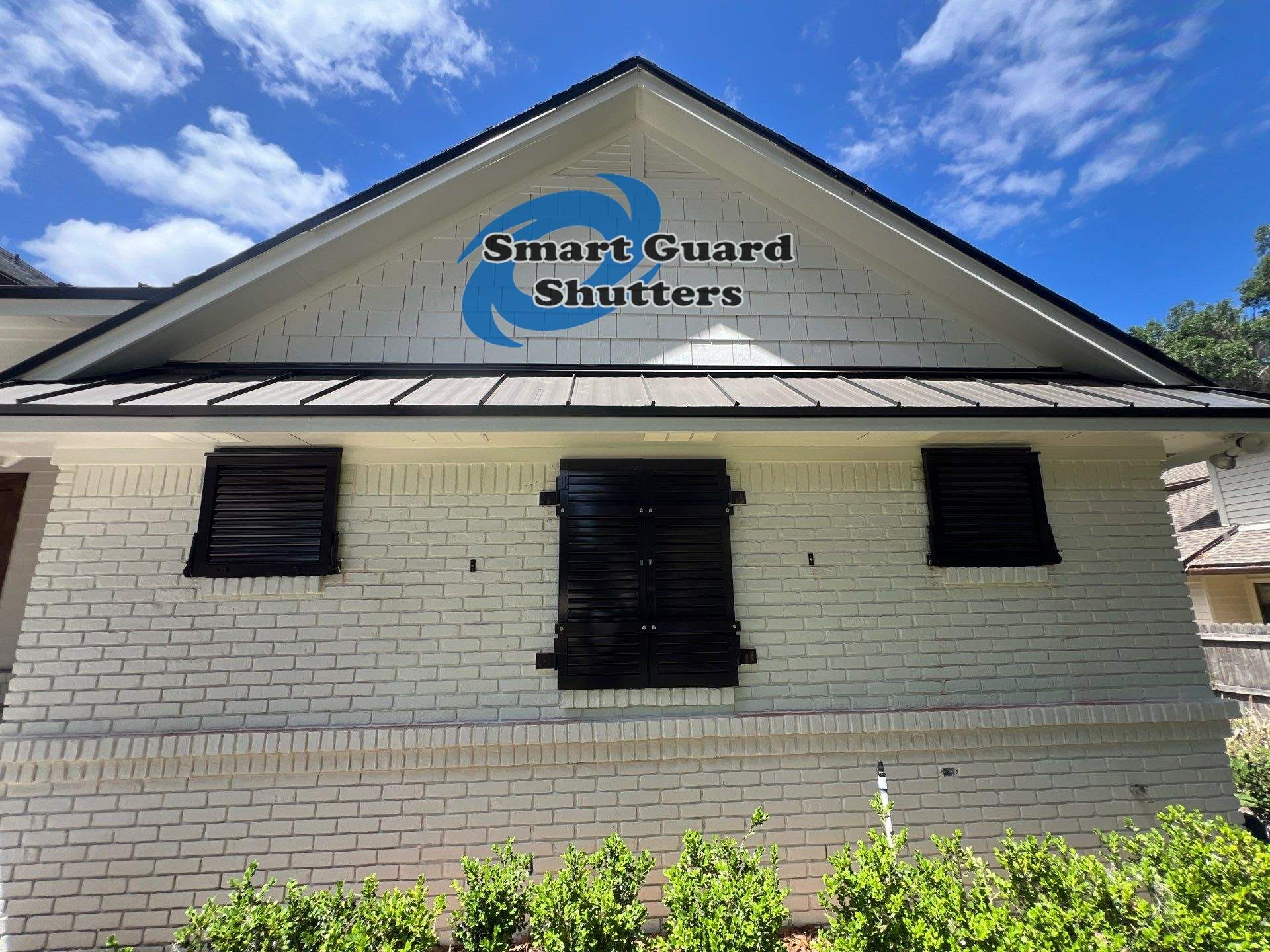 Impact Colonial & Bahama Shutters in Jet Black by Smart Guard Shutters