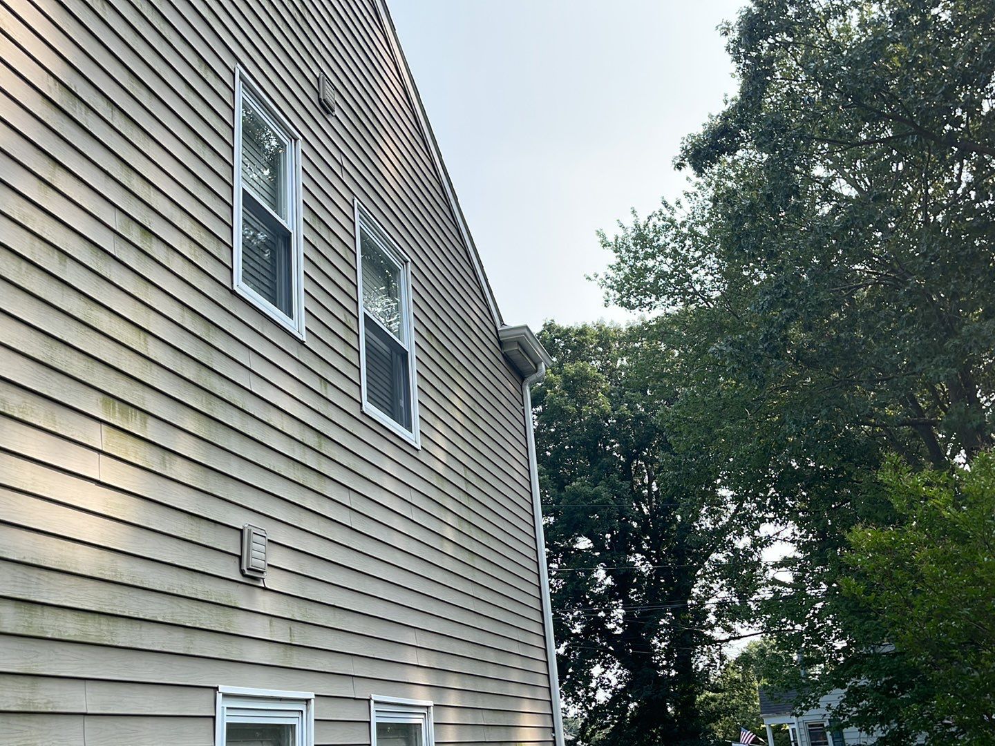 Gutter Installation using 5k White gutters by A Plus Exterior