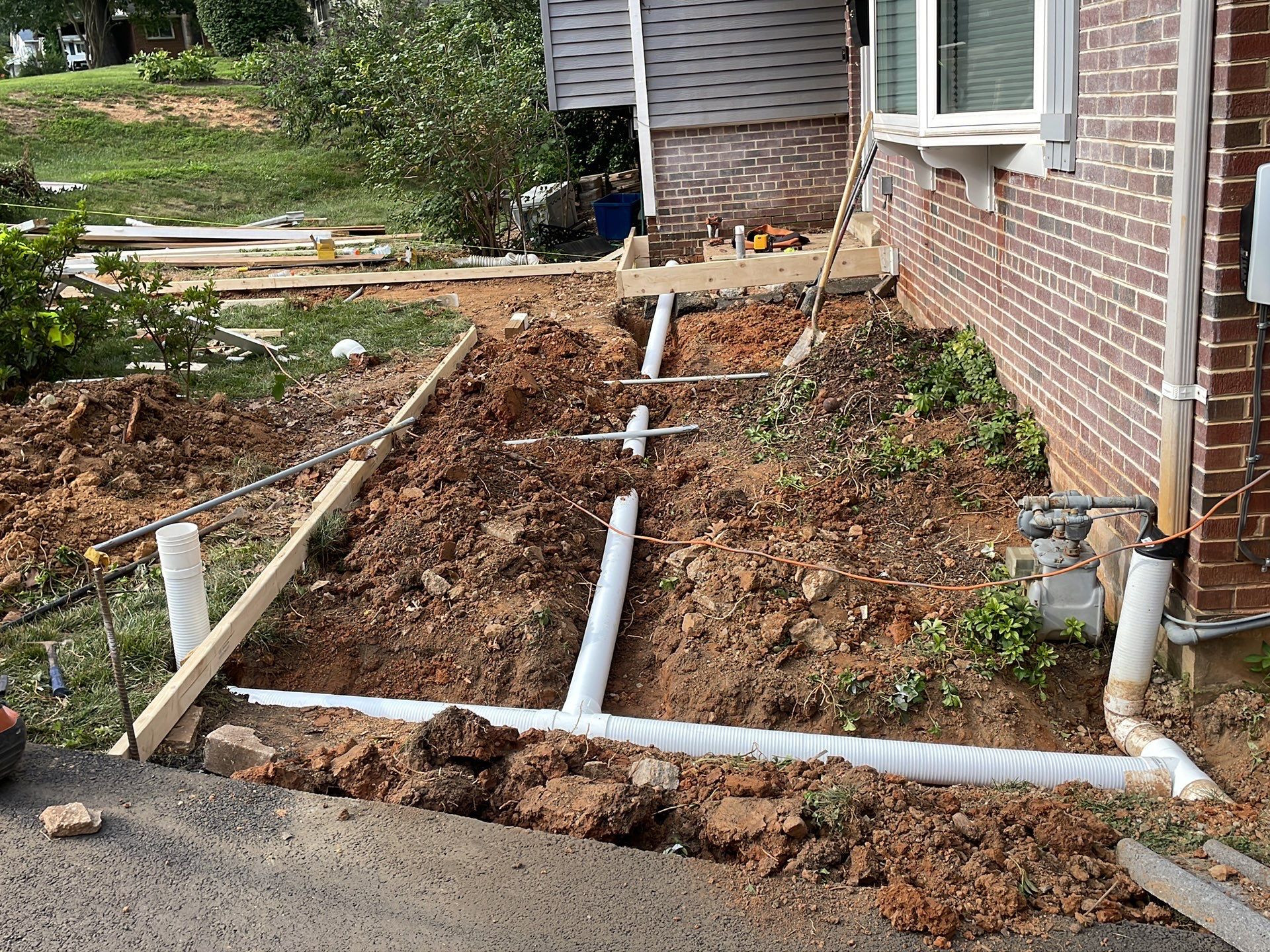 New walkway with stairs and a new front porch by Fairfax Contractors, LLC