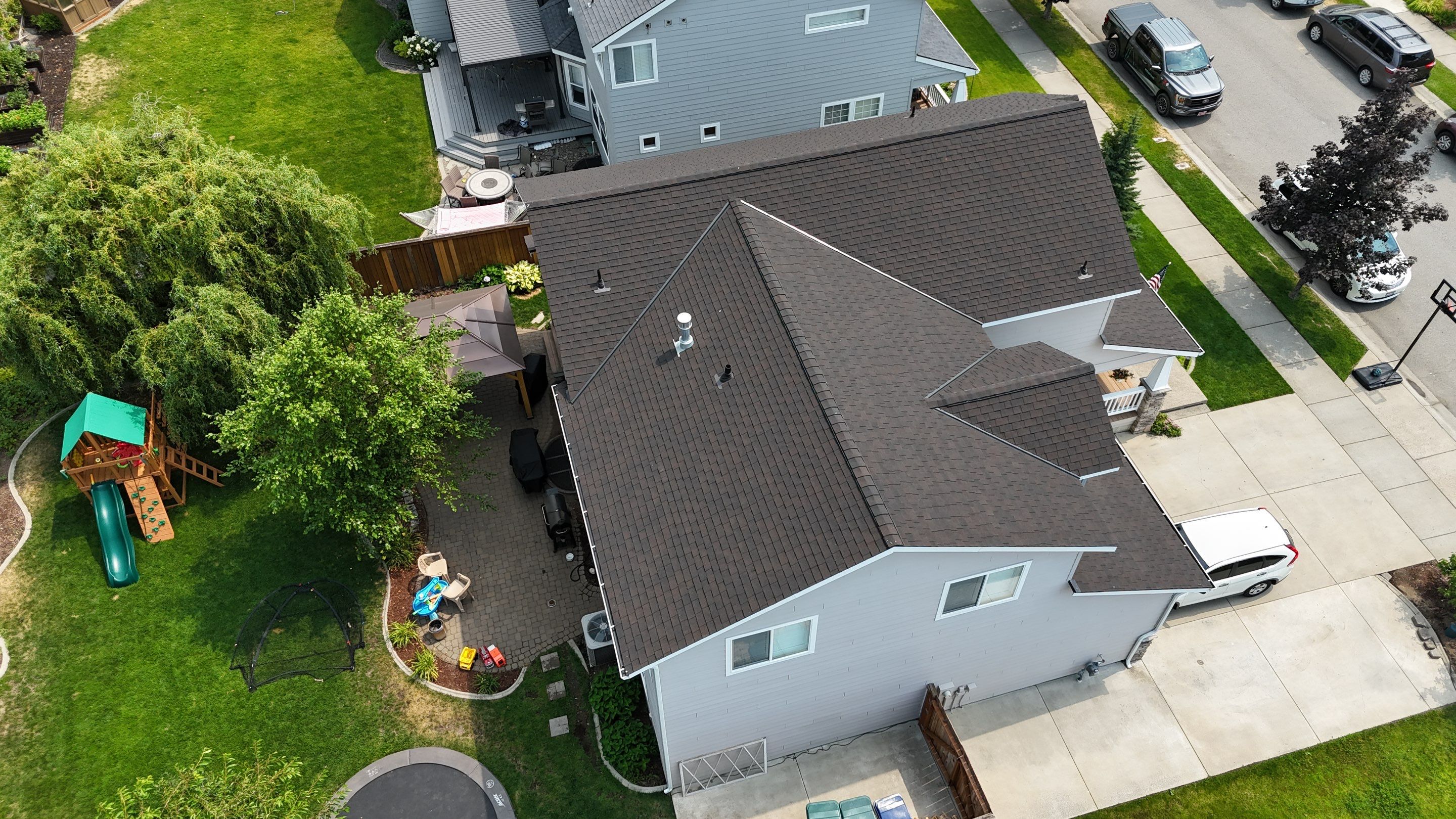 Alpine Roofing Enhances Marceille Court Homes in Coeur d'Alene, Idaho with CertainTeed Landmark TL Shingles - Max Def Black Walnut by Alpine Roofing