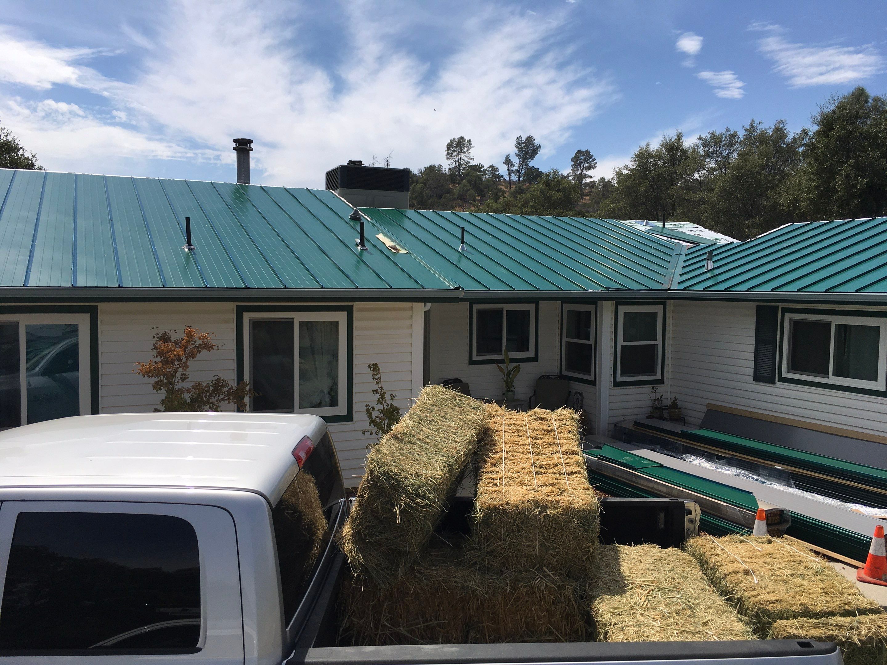 Metal roofing installation using Standing seam metal roofing system by Straight Edge Roofing Inc