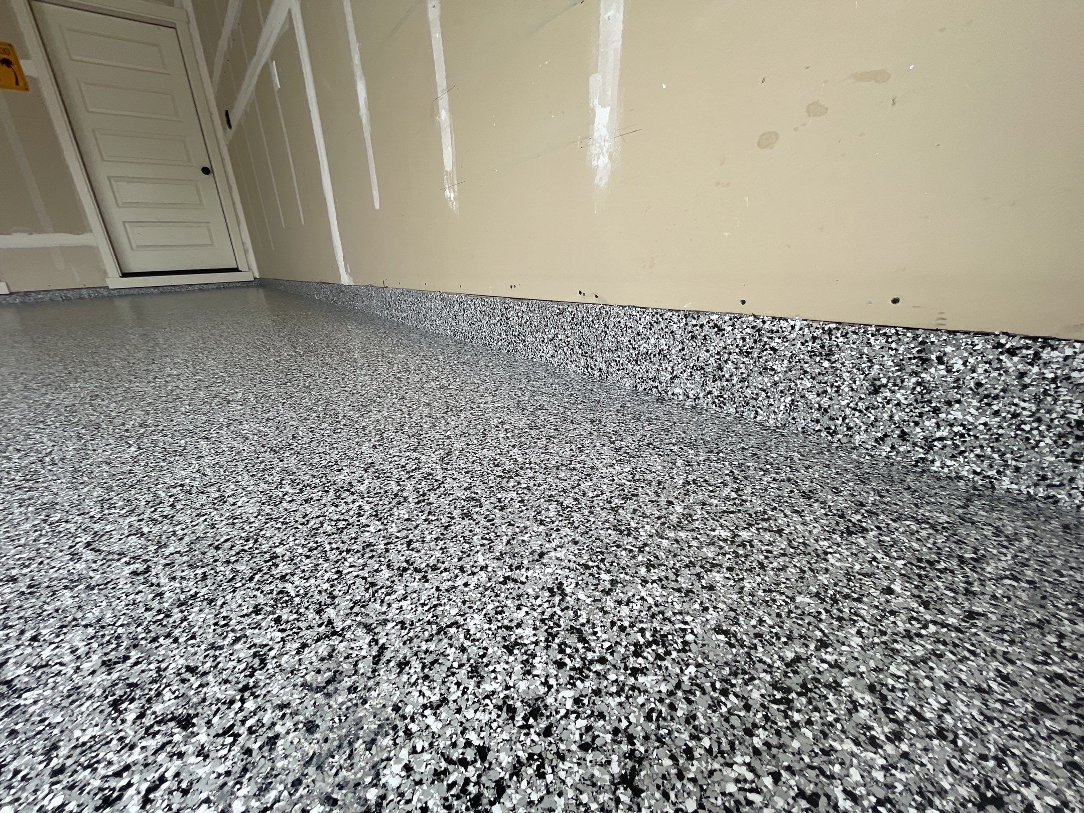 Garage Transformation using Domino by Croc Coatings, LLC