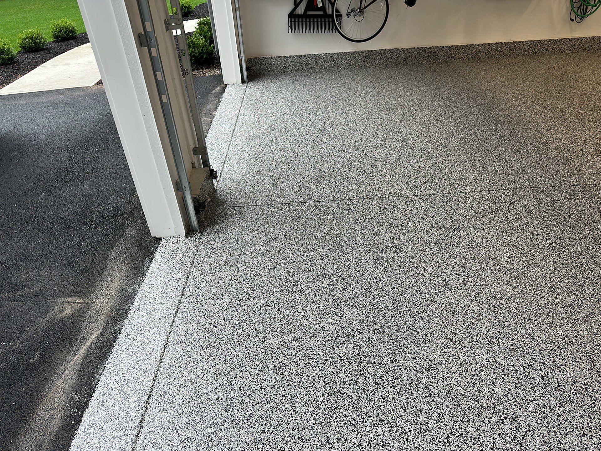 Garage in Norfolk, MA 02056 by Symphony Concrete Coatings