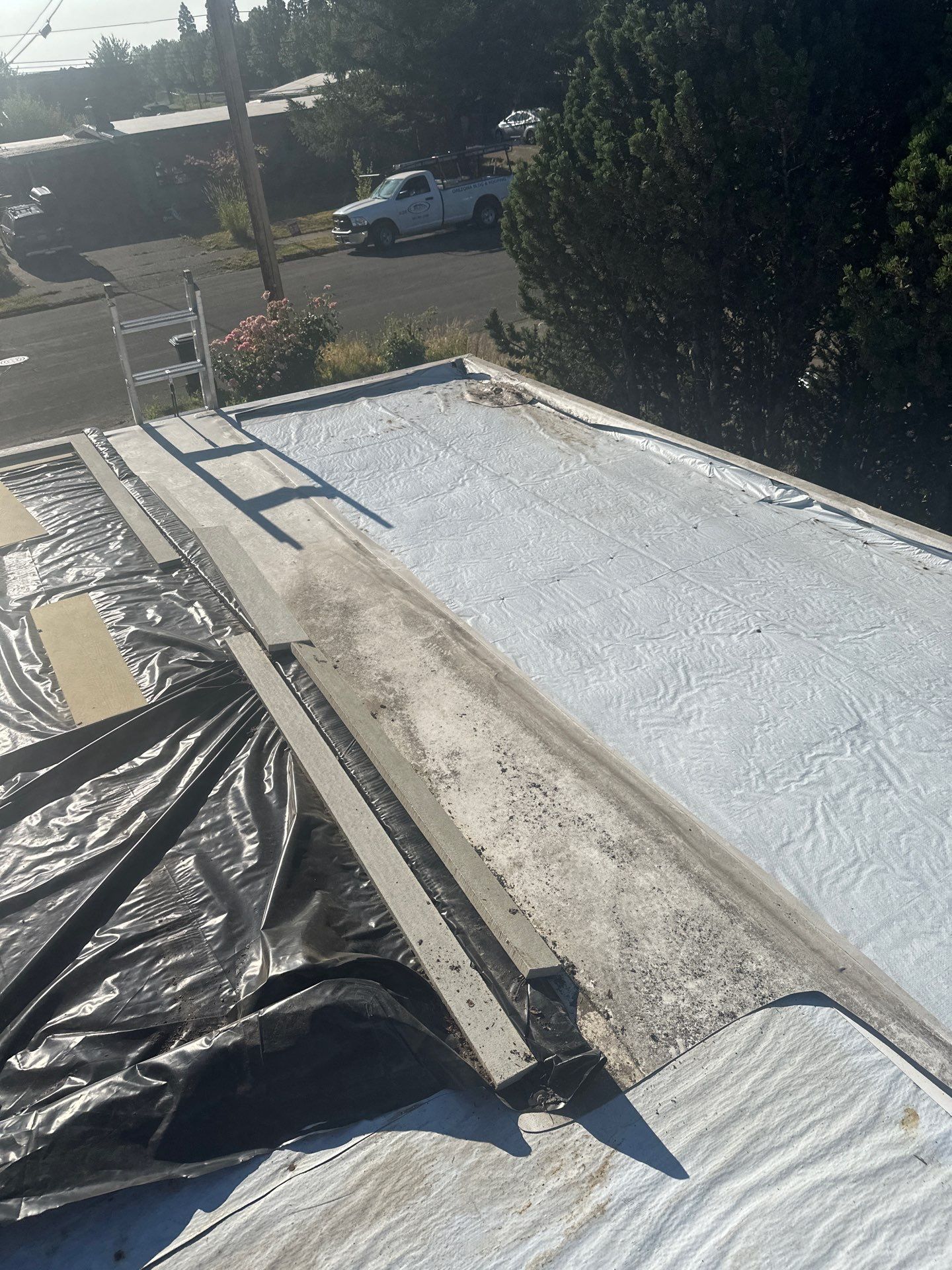 Residential Flat Roof Installation using GAF 60Mil TPO  by Orezona Building & Roofing Company, Inc.