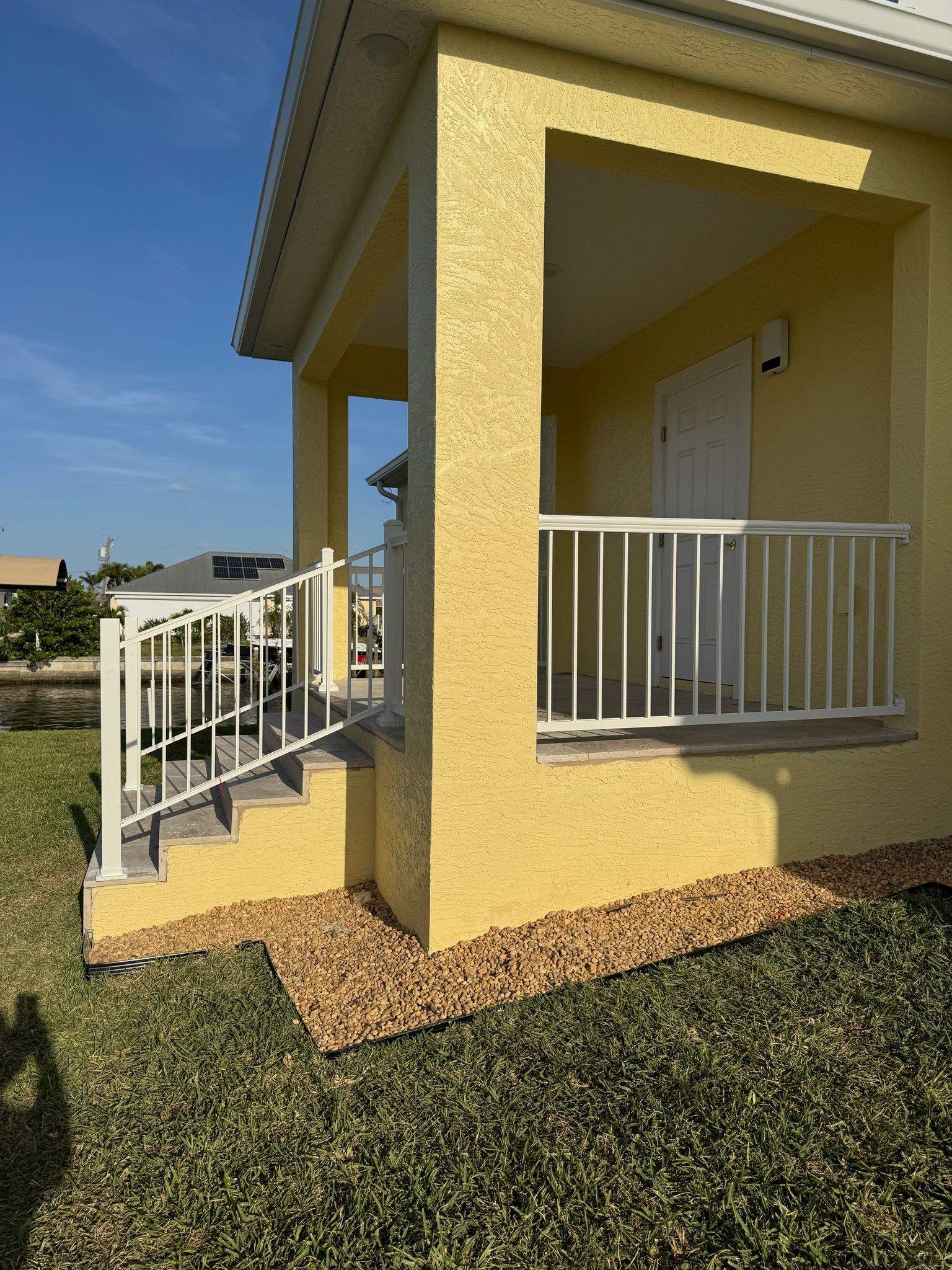 Vinyl Privacy Fence and Porch Railing Installation in Port Charlotte by True Fence LLC