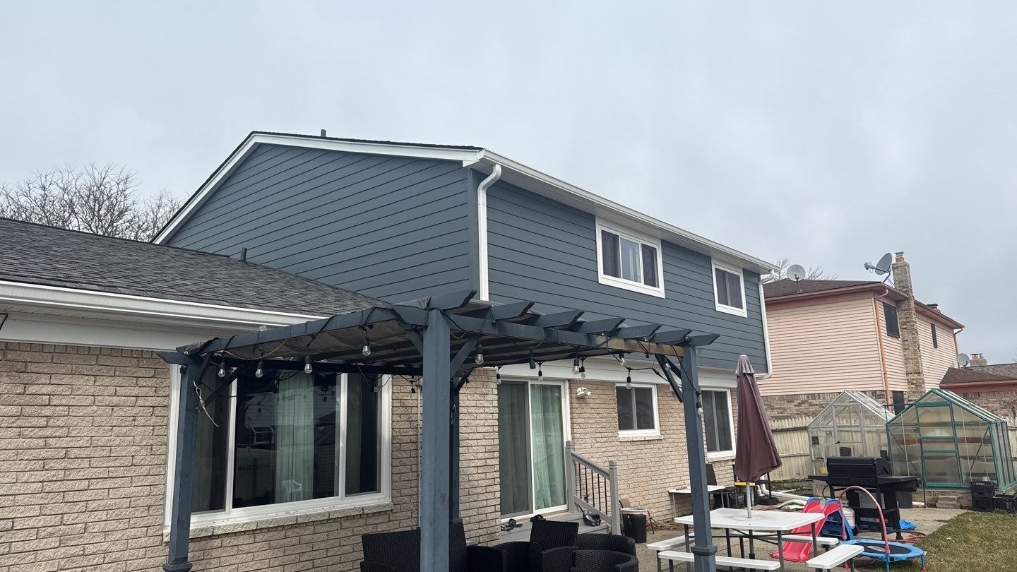Siding Replacement using Alside Midnight Blue by 180 Contractors