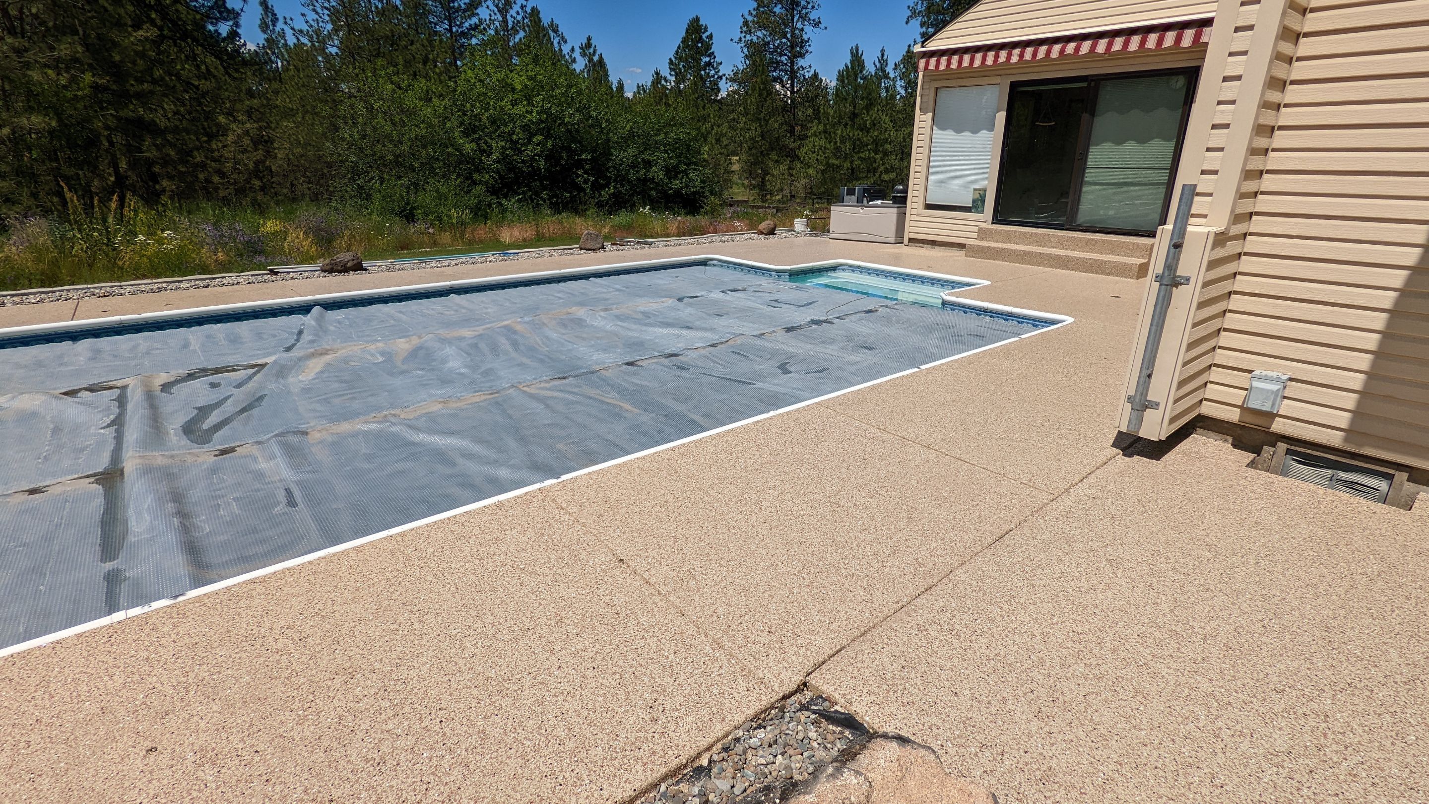 Garage Transformation using Domino for Garage and Pecan for Pool Deck by Croc Coatings, LLC