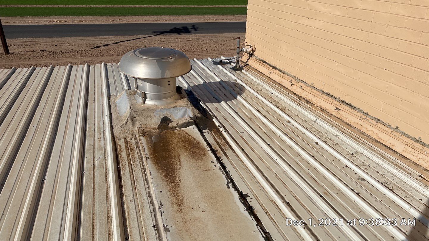 Metal roof restoration on commercial roof using Conklin Benchmark/PUMA XL fabric and coating by Straight Edge Roofing Inc