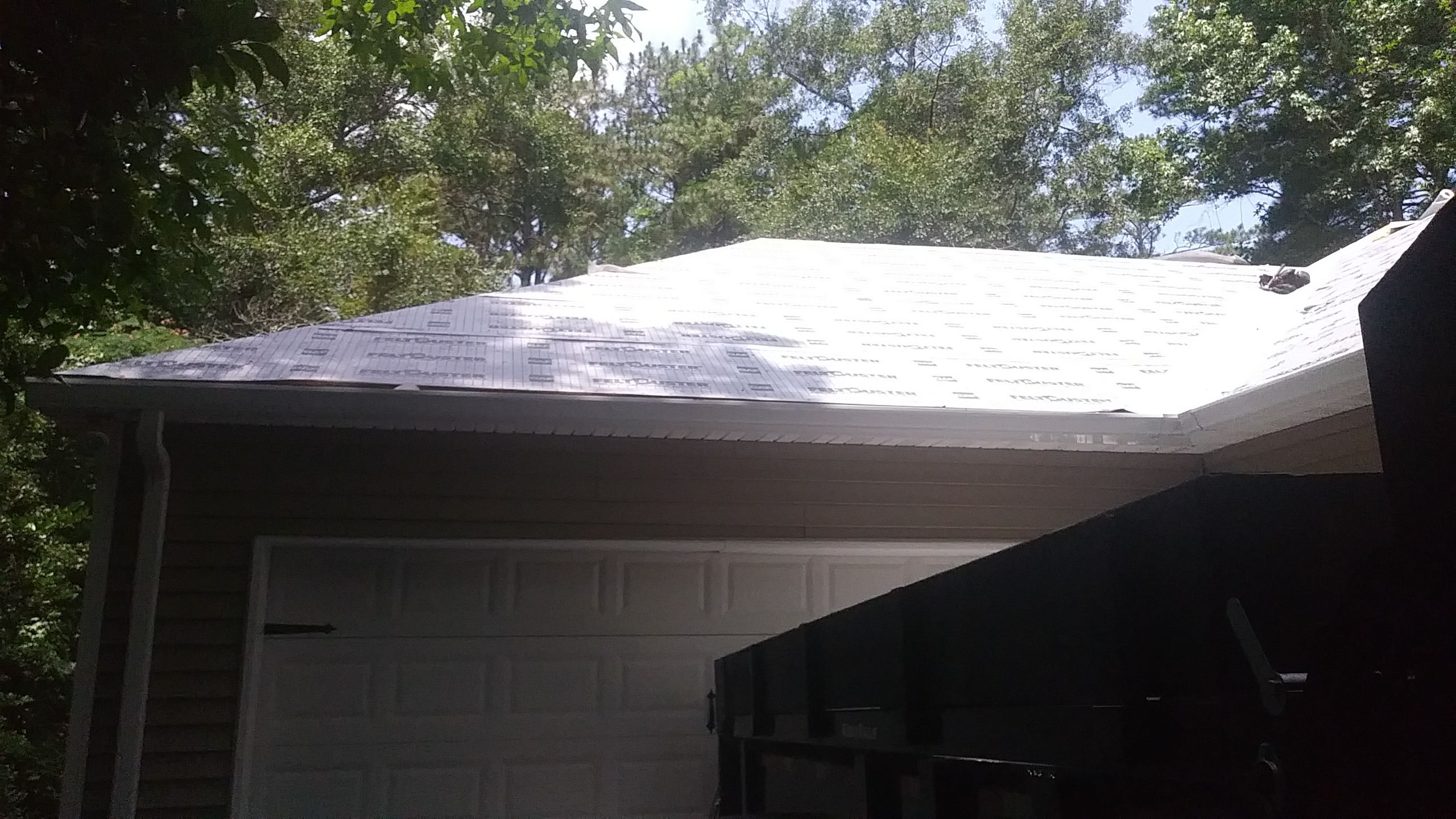 Residential Roofing Installation using Roof Replacement by American Roofing & Construction LLC