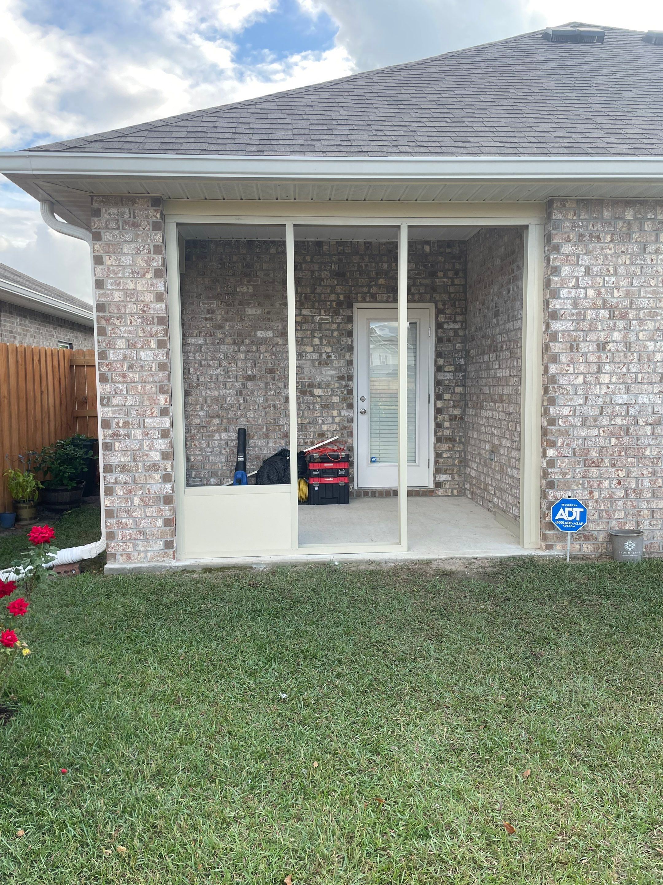 Panama City Glass Room Under Existing Patio Cover by Titan Sunrooms