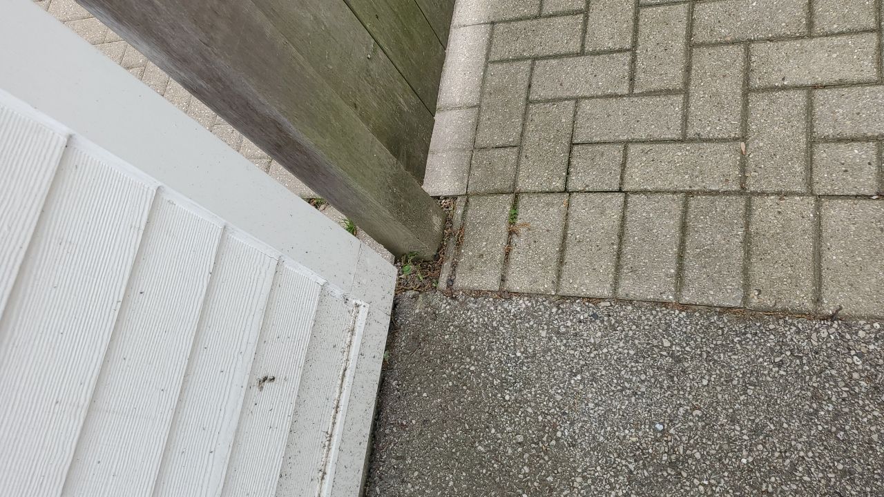 Brick patio repair, clean sand and seal by Northern Power Washing LLC.