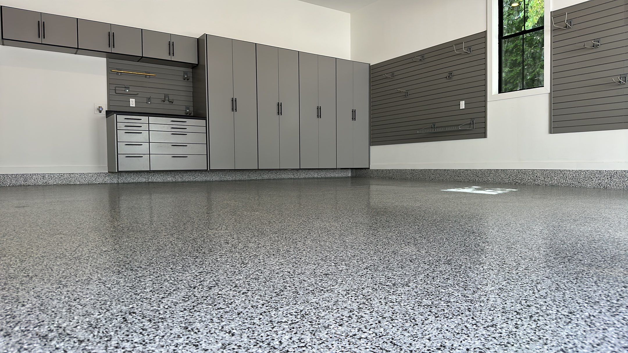 Jeanne E. transformed her garage with cabinets and a Banner Garage Floor by Banner Garage