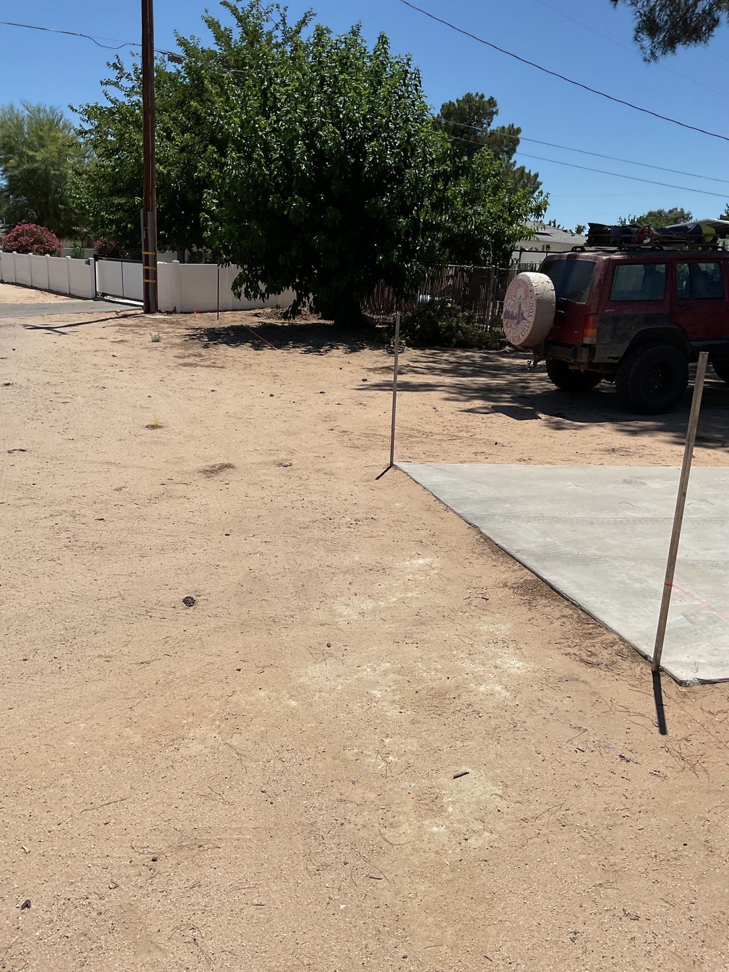 4ft White Vinyl Fence with Solar Power Motorized Gate by Fence Guys Inc.