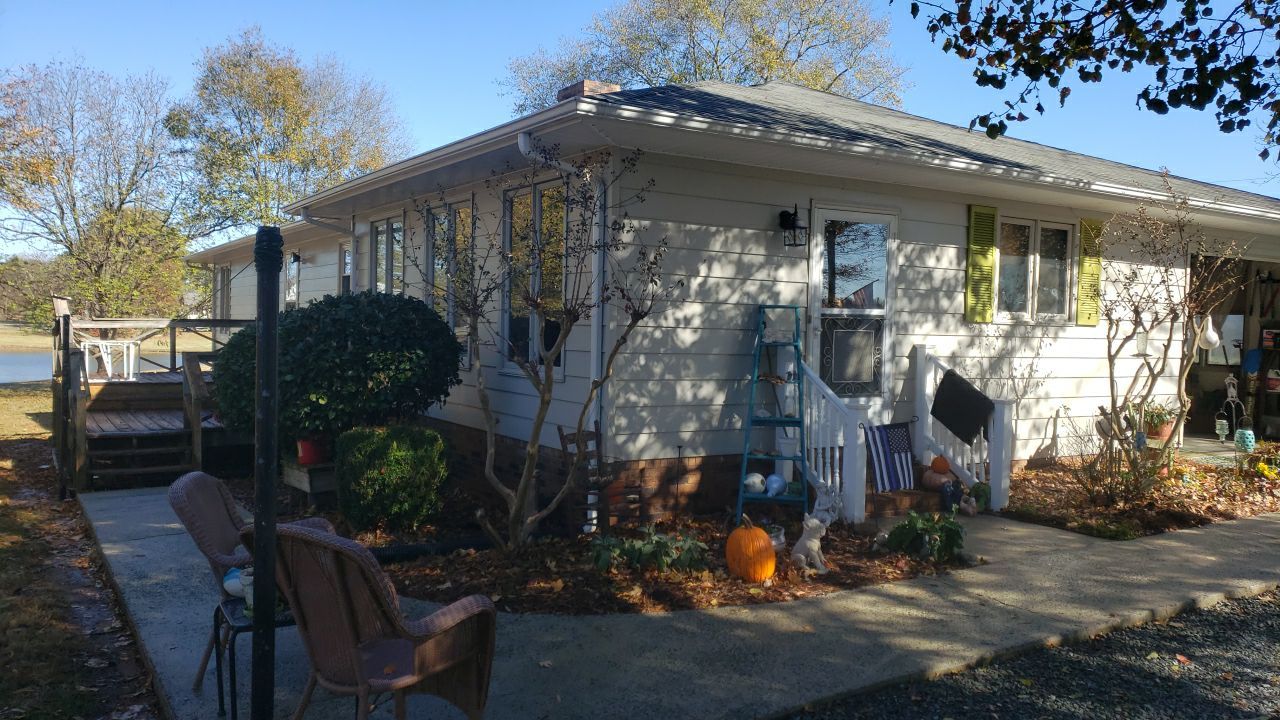 gutter cleaning and house wash and gutter guard installation by Power Wash Masters LLC