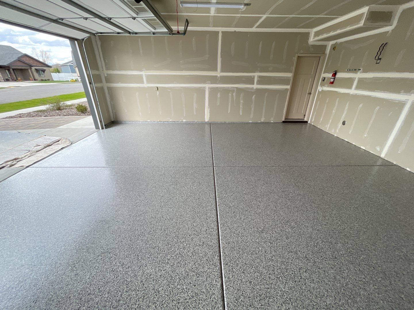 Garage Transformation using Slate Stone by Croc Coatings, LLC