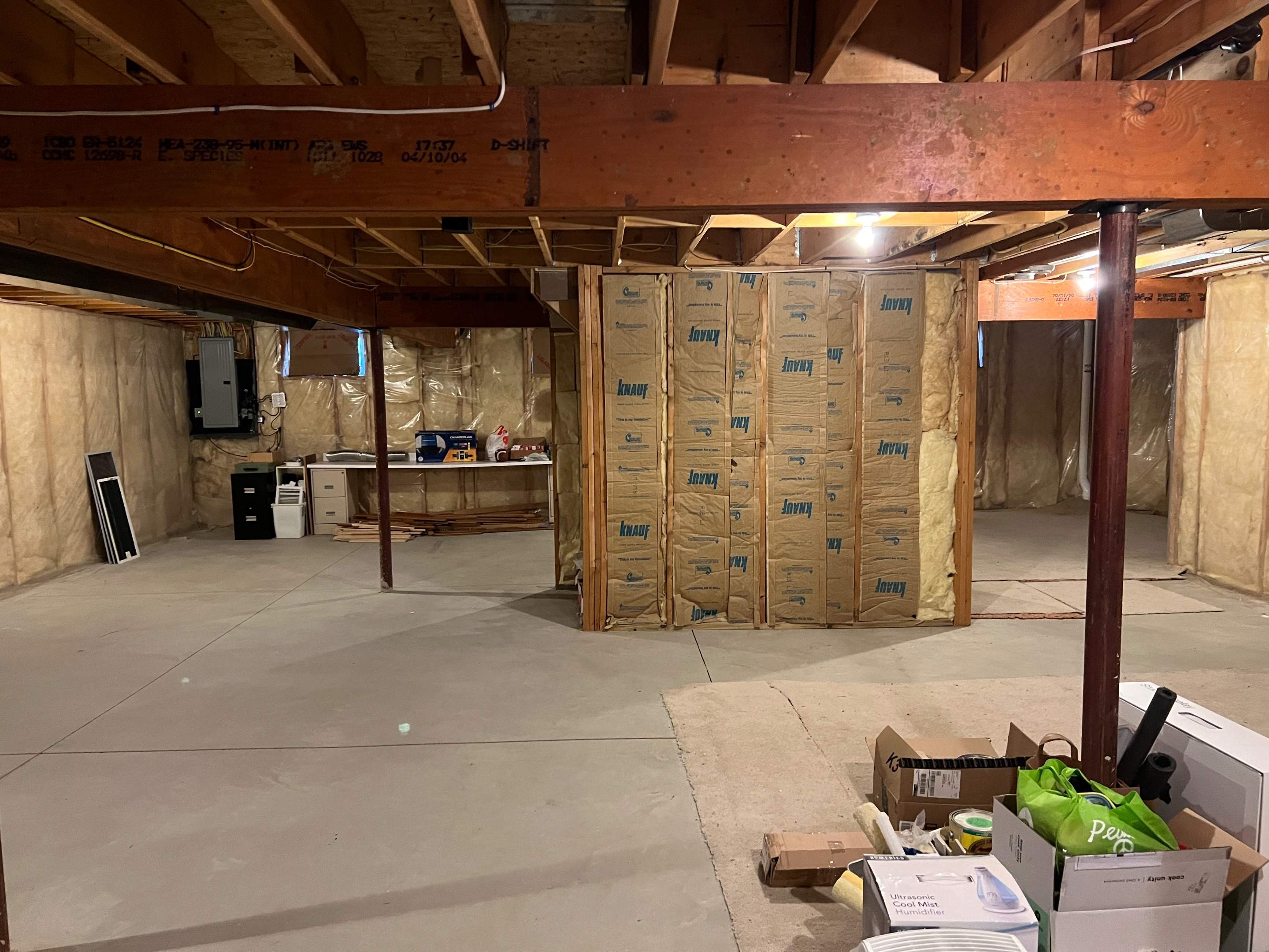 Basement Remodel w/ LVP Flooring & Exposed Ceiling by Chagnon Building & Remodeling LLC