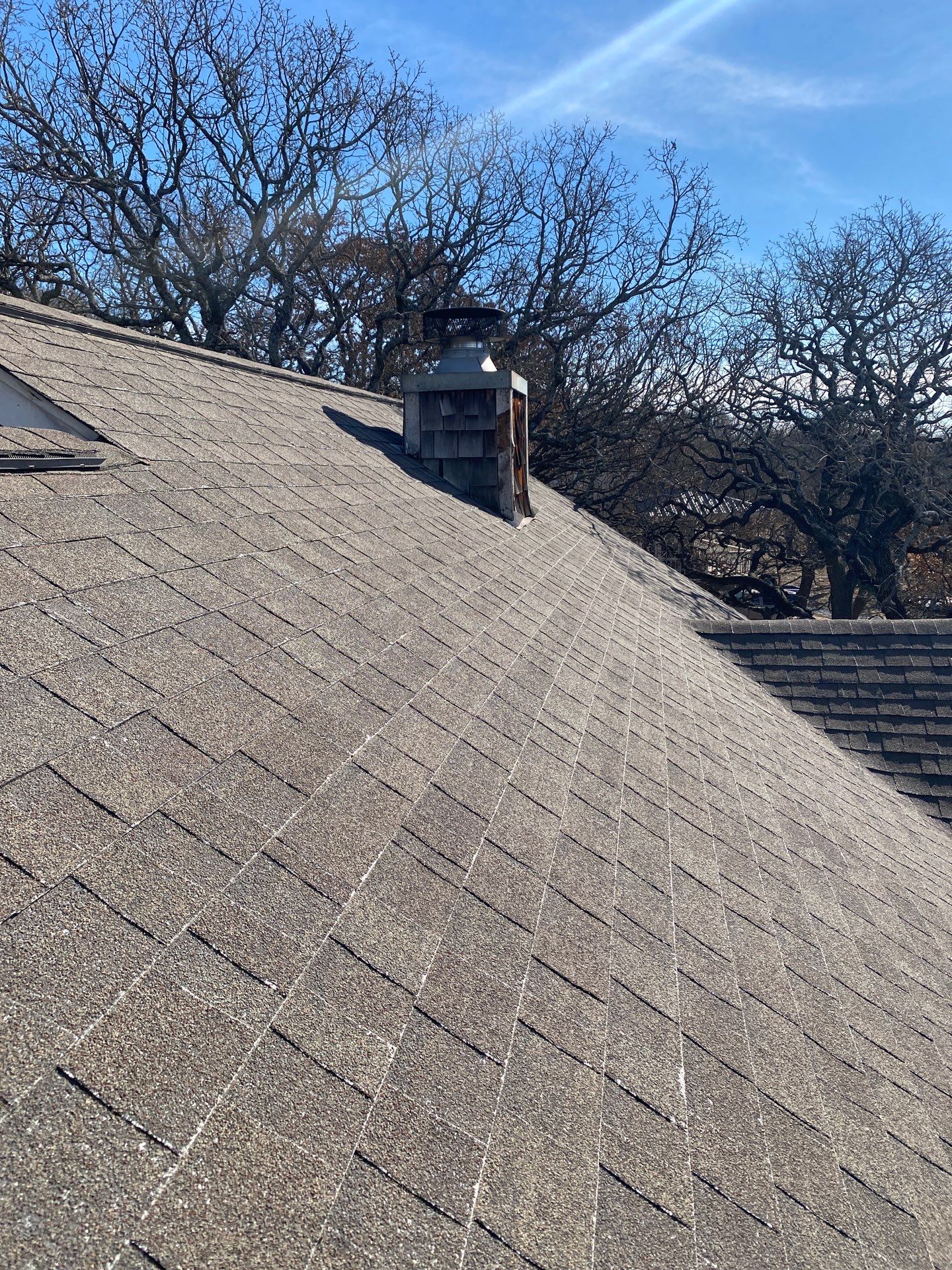 Roof Replacement on a private lake near Ardmore by BANA Roofing and Solar Supply