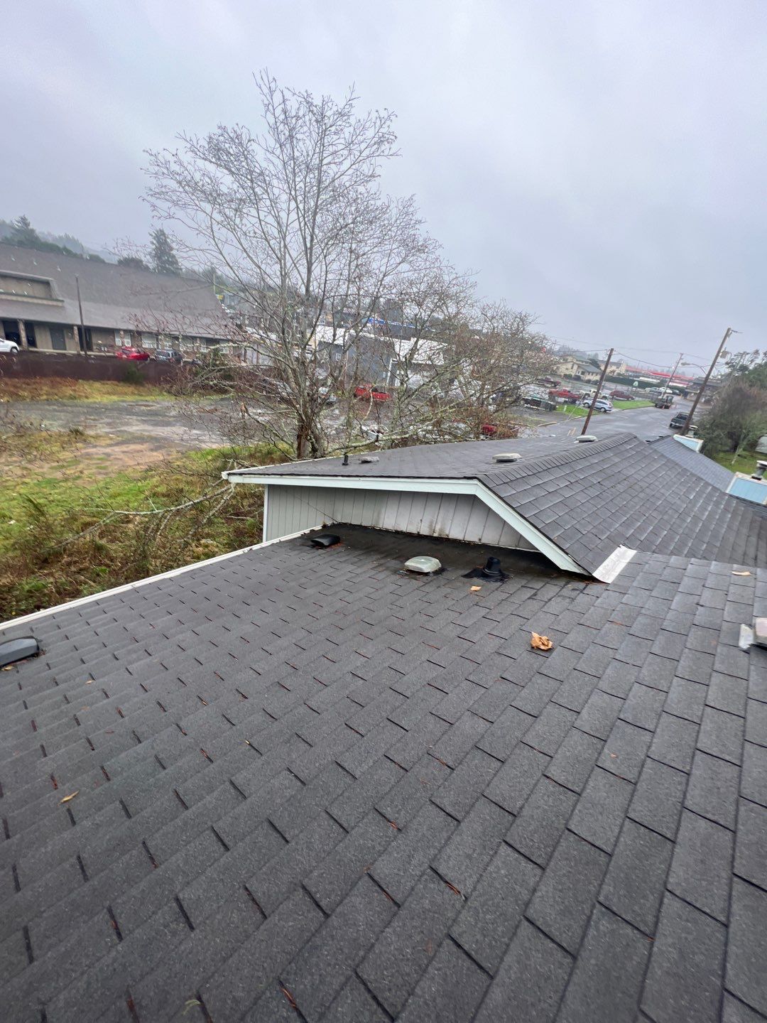 Residential Roofing Installation using Malarkey Highlander (Color: Midnight Black) by Orezona Building & Roofing Company, Inc.
