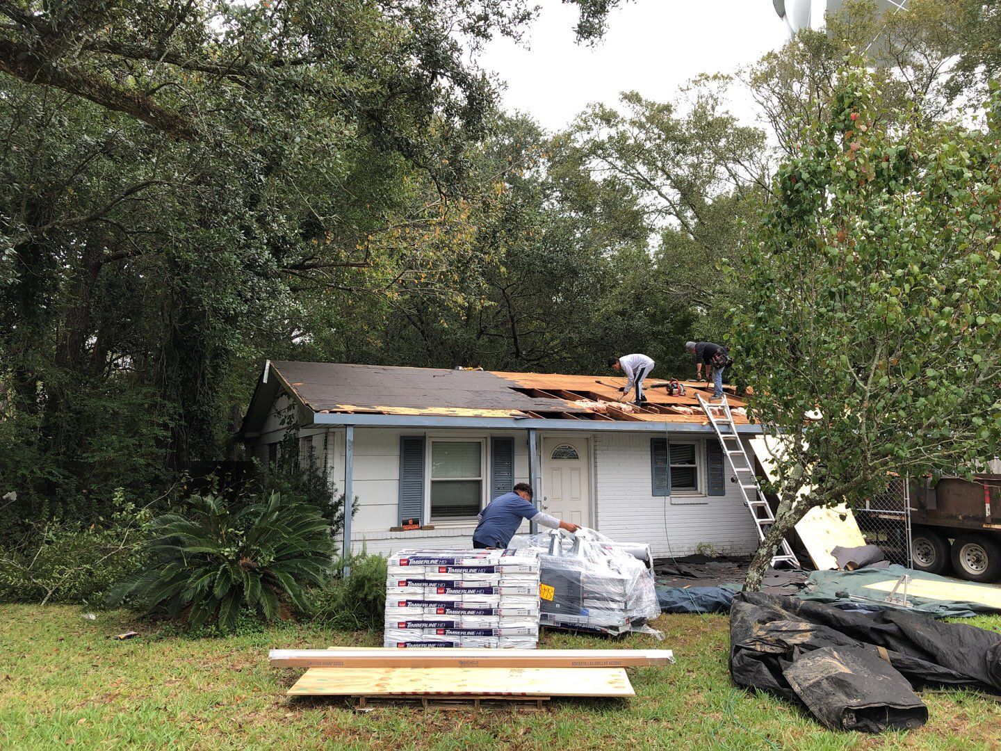 Residential Roofing Installation using Roof Replacement by American Roofing & Construction LLC