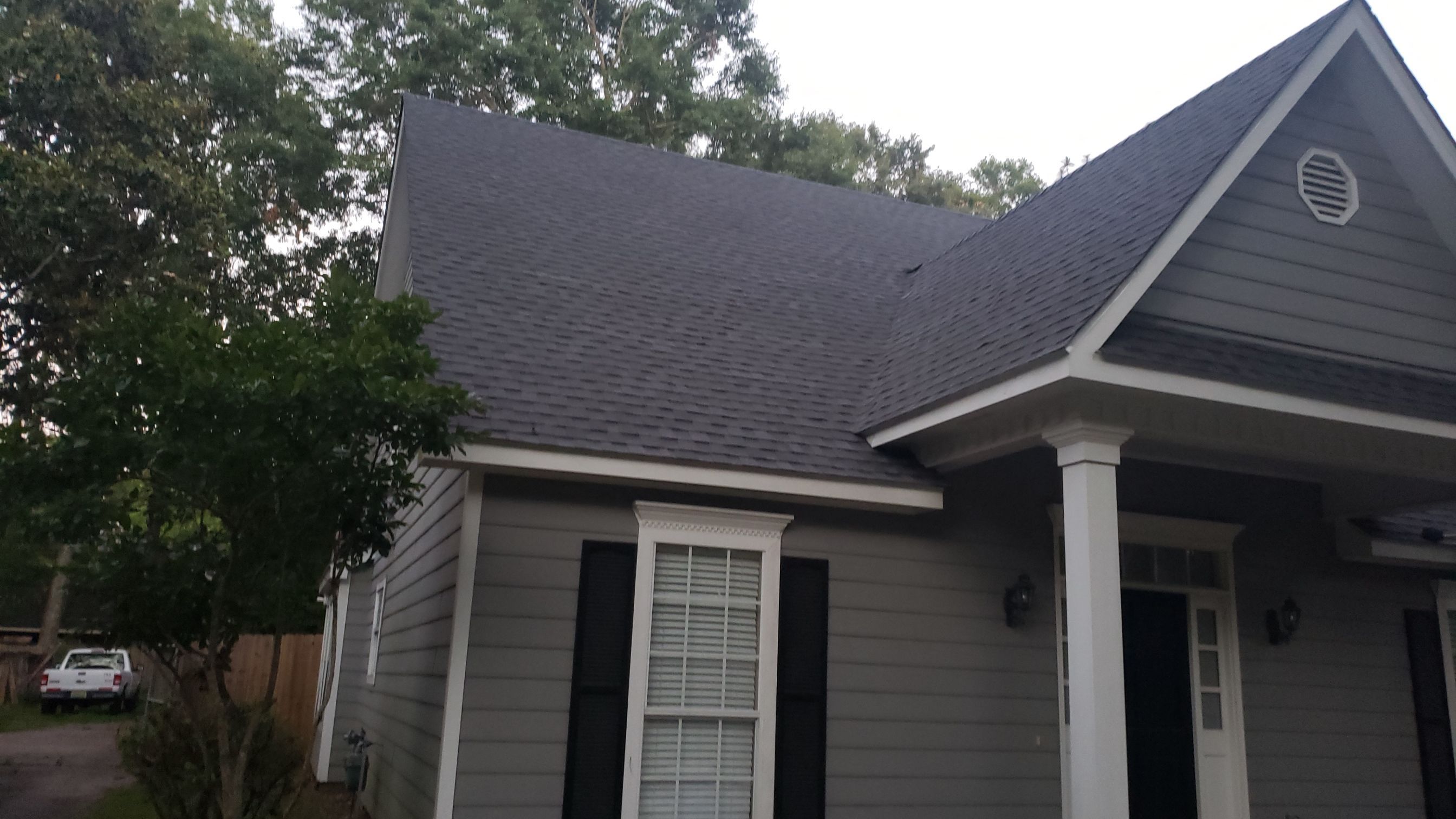 Residential Roofing Installation using Roof Replacement by American Roofing & Construction LLC