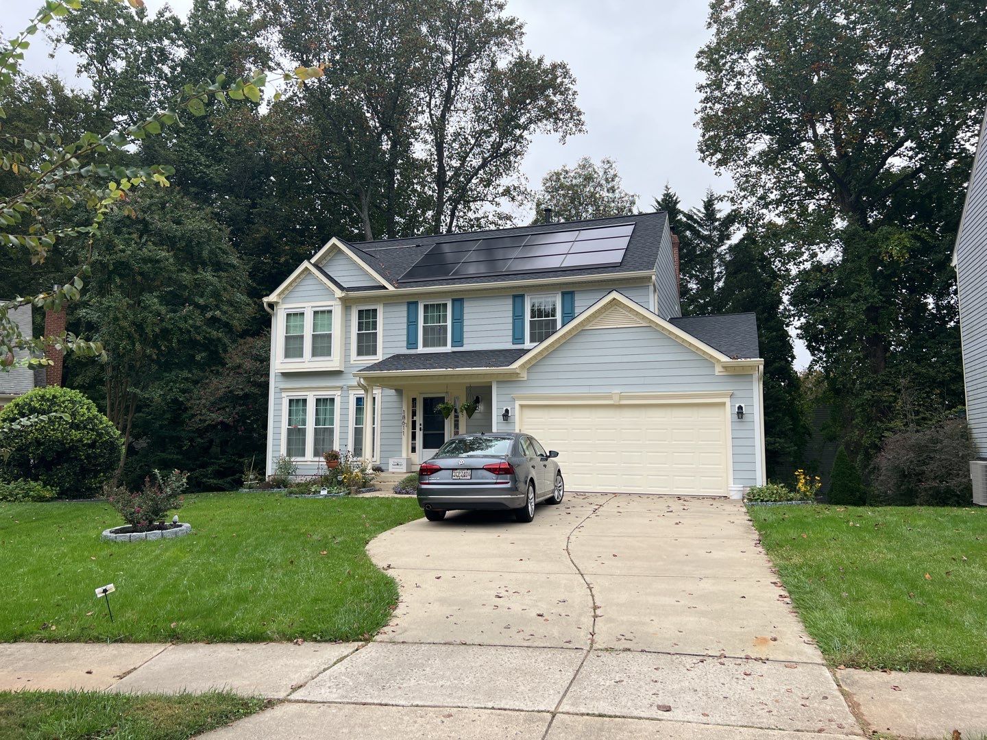 Exterior Home Makeover using GAF Timberline HDZ, GAF Decotech, and James Hardie Siding by American Home Contractors