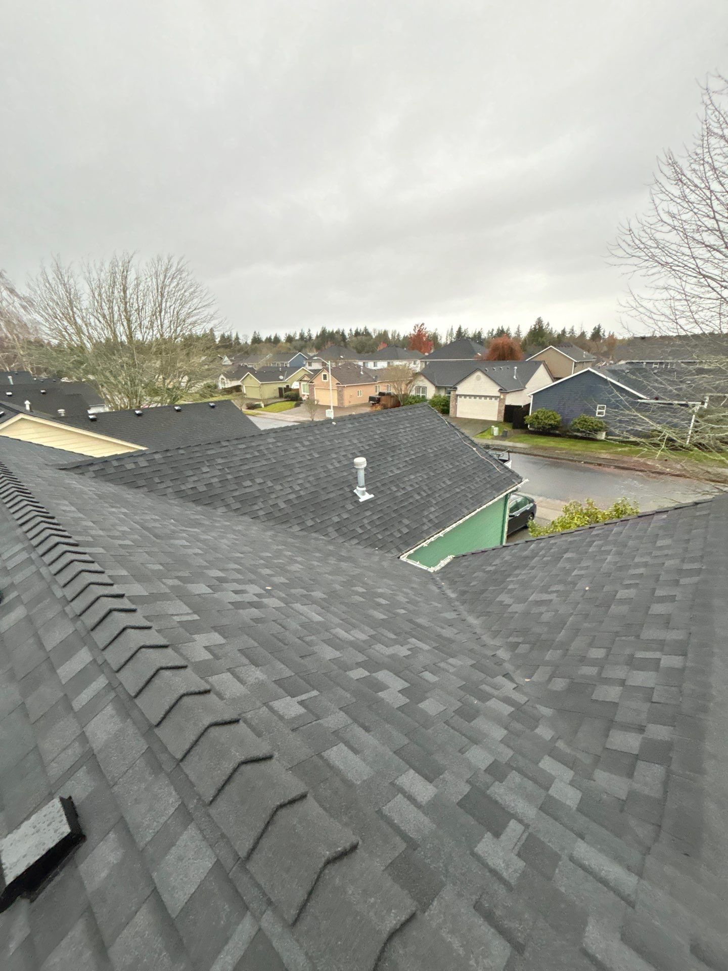 Residential Roofing Installation using IKO Dynasty (Color: Granite Black) by Orezona Building & Roofing Company, Inc.