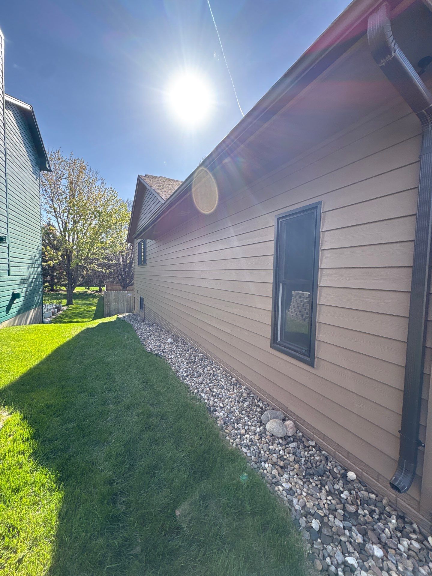 Wood Siding Restoration and Exterior Painting in Sioux Falls by Select Painting, Coatings & Garage Cabinets