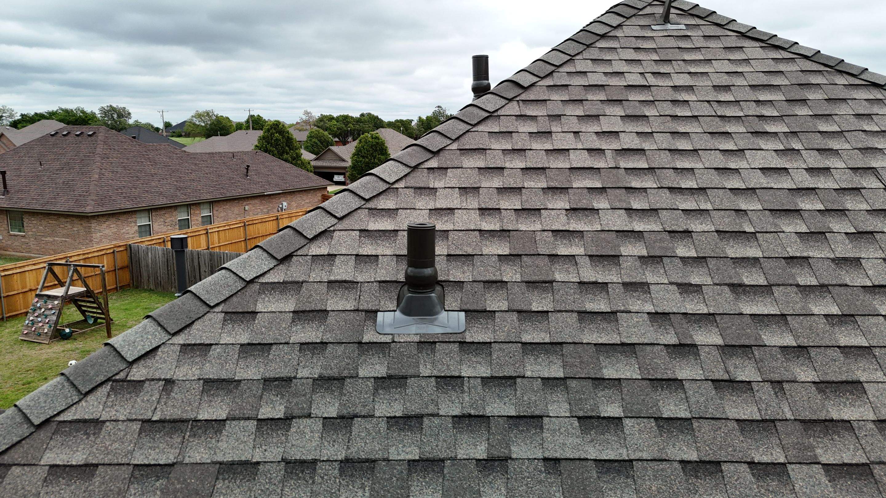 Roof & Gutters in Yukon, OK by 5Coat Roofing & Construction