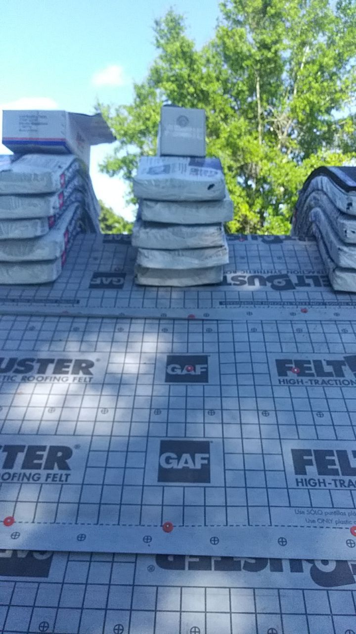 Residential Roofing Installation using Roof Replacement by American Roofing & Construction LLC