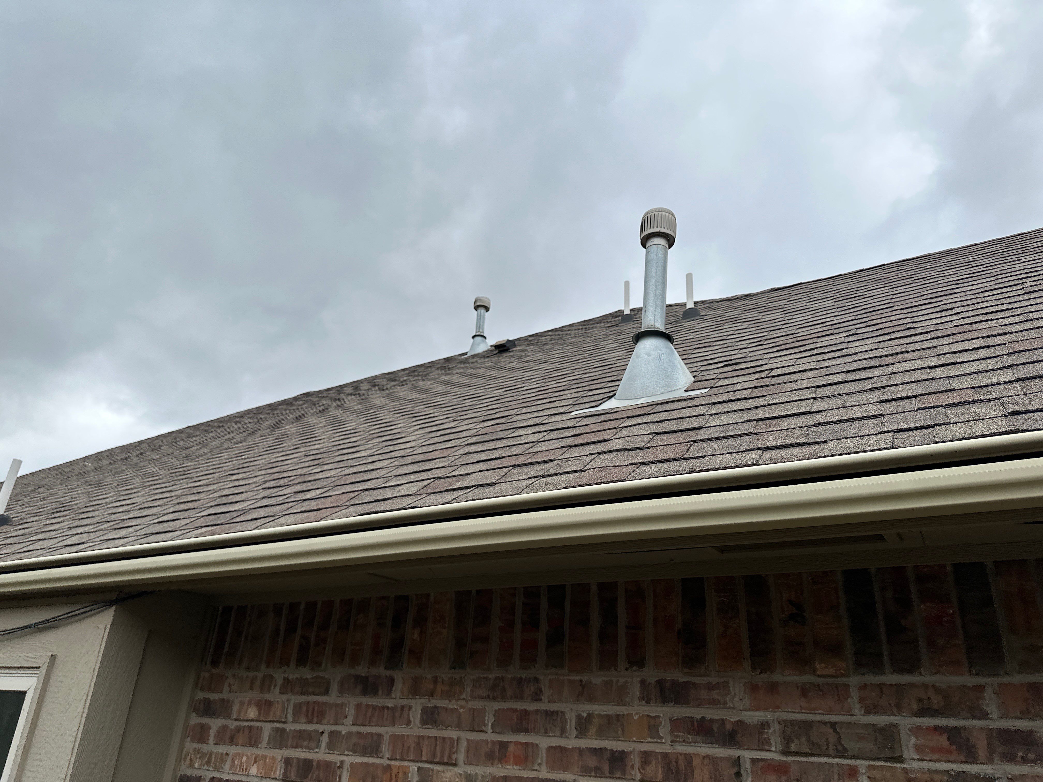 Reroof using Owens Corning Duration Storm IR in Driftwood by Castillo Roofing