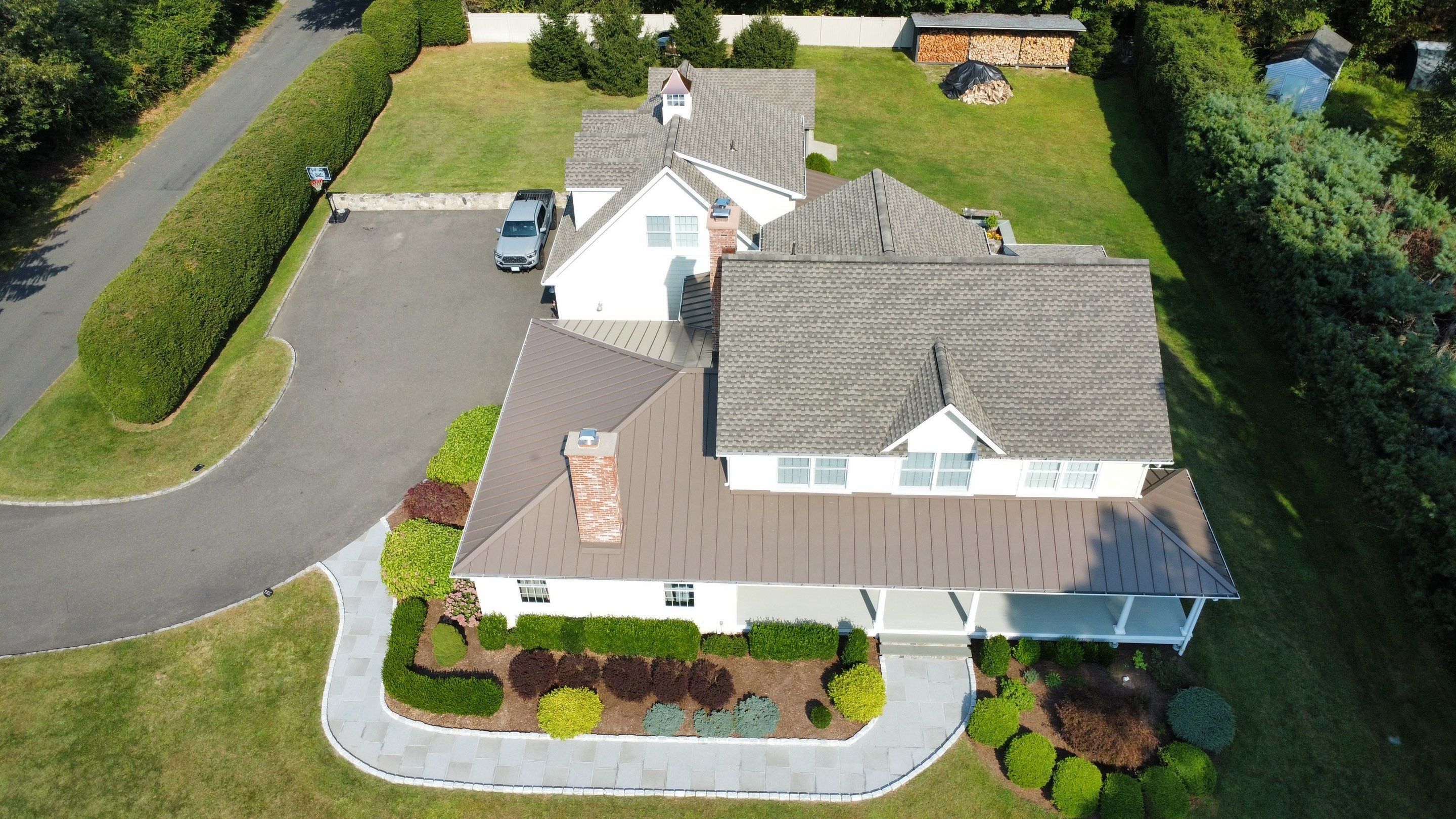 Asphalt & Standing Seam Metal Roof Replacement  by Lecla Home Improvements and Roofing INC
