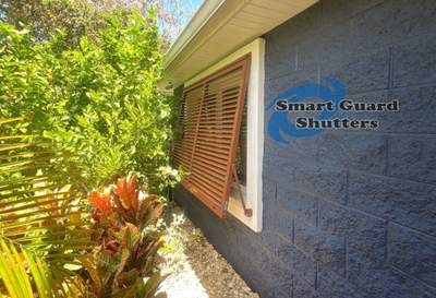 Impact Rated Bahama Shutters in Beige Brown