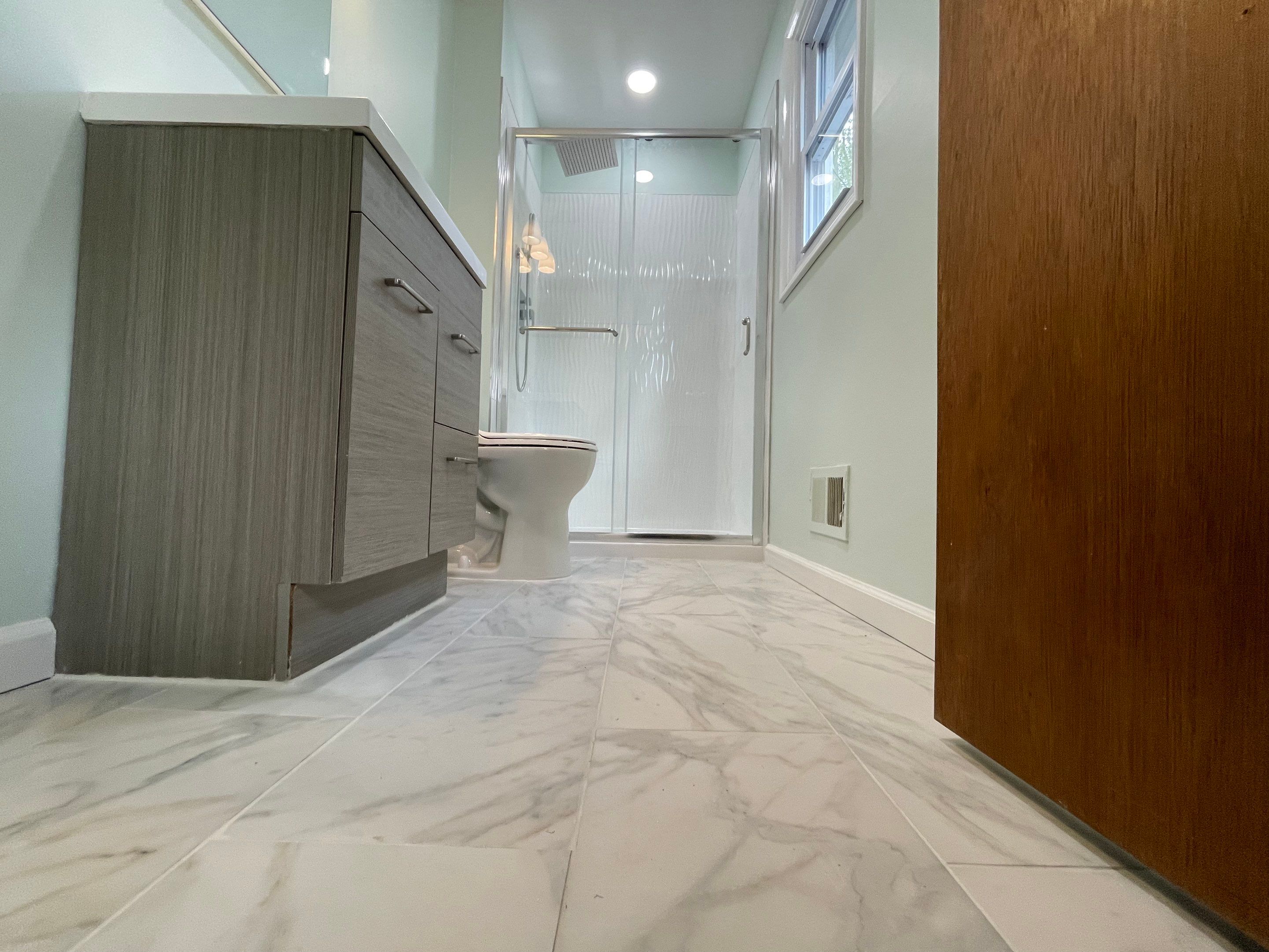 Bathroom Remodel using Tile by Home Concepts Construction