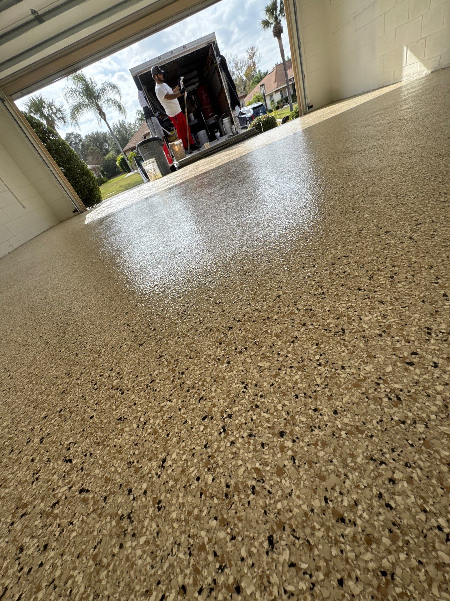 Shoreline Flake Garage with High-End Neutral Tones by Performance Floors & Coating