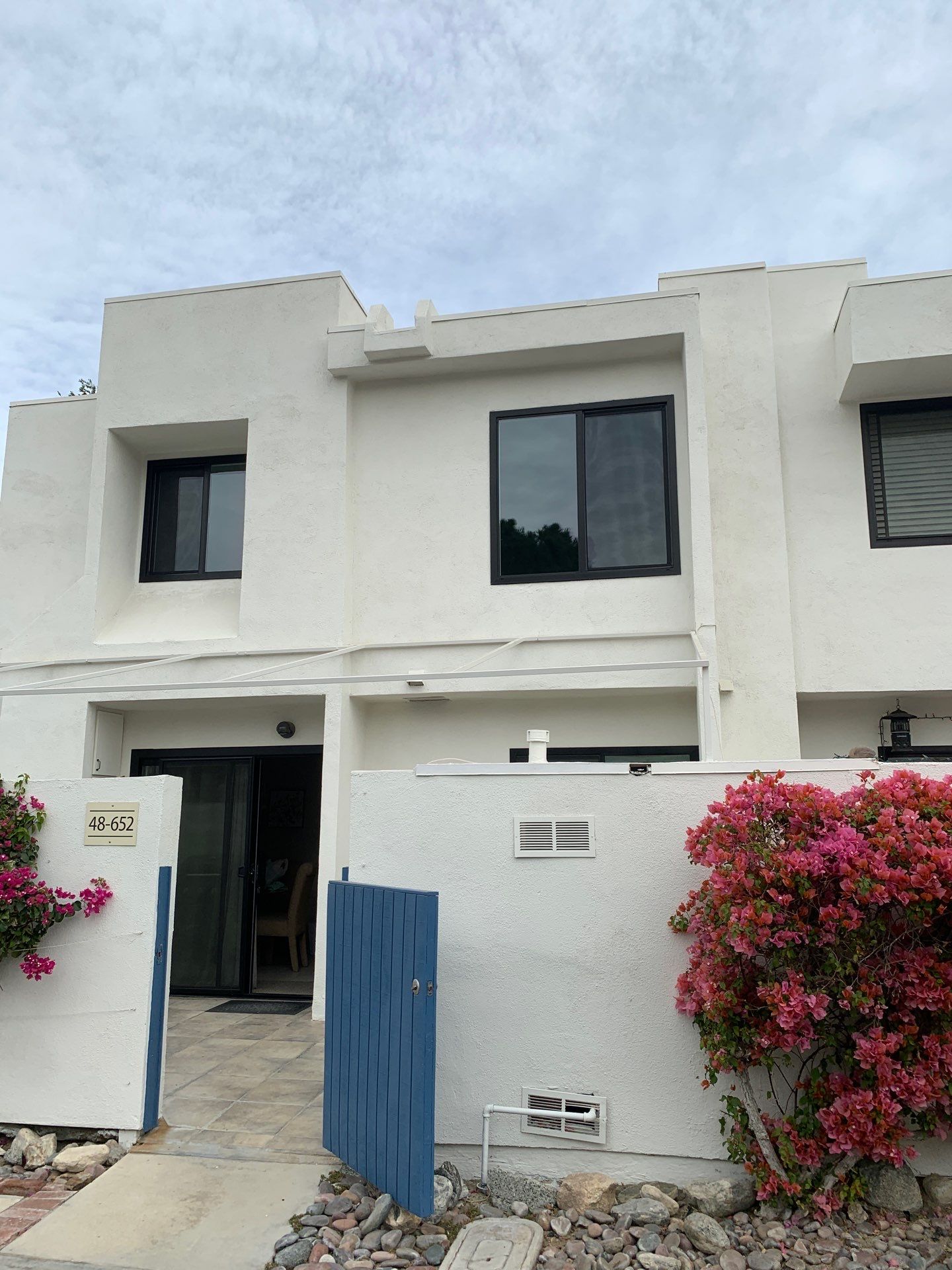 Window Installation using AMSCO Black Vinyl Windows by American Window Company