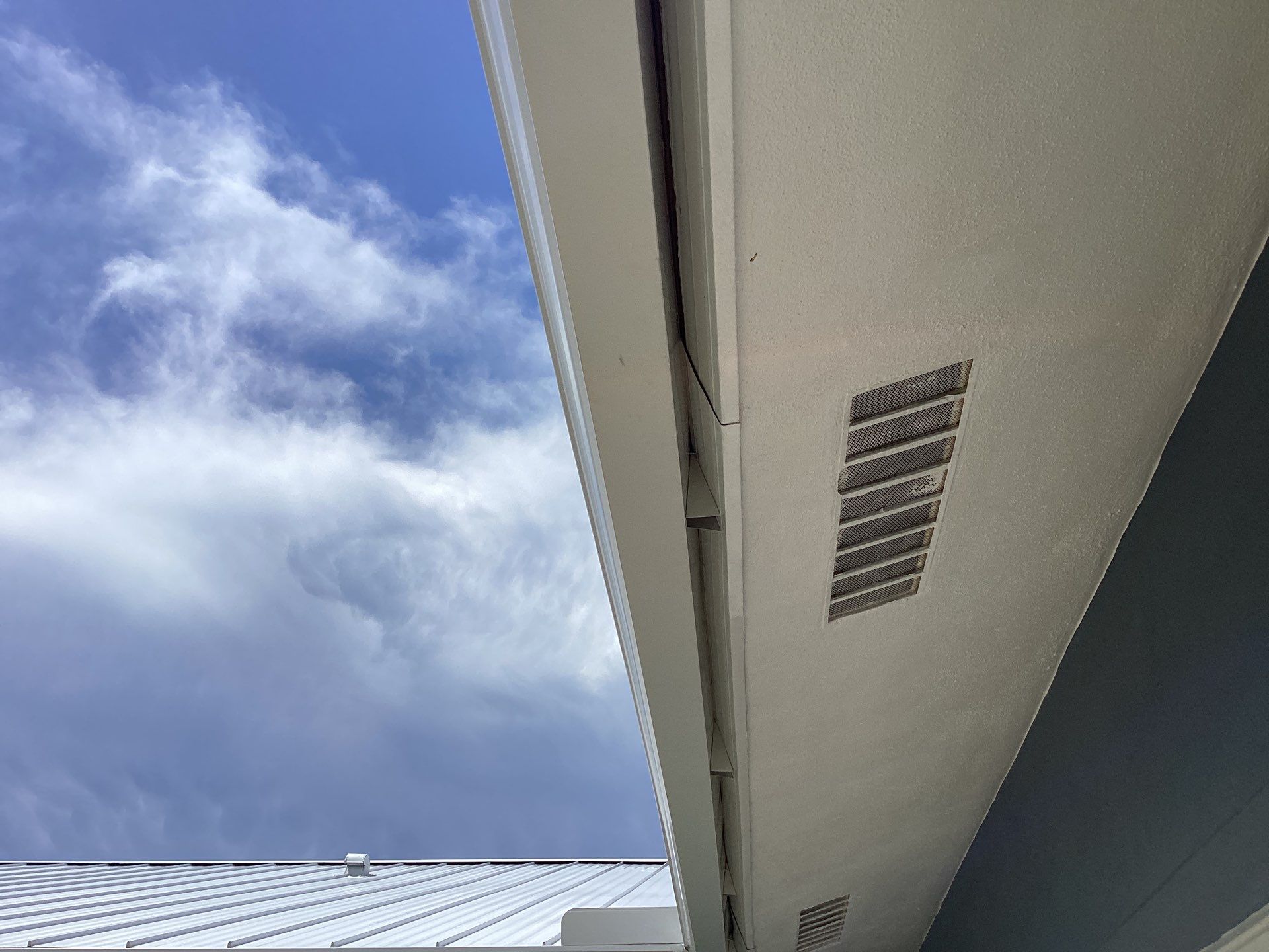 White Downspouts and Gutters Combo in Punta Gorda FL by Gutter Professors