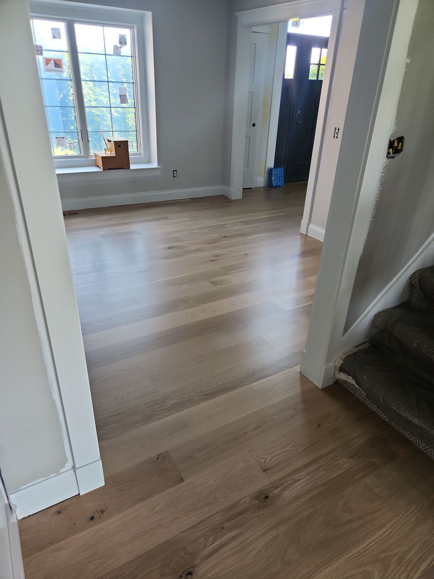  7 inch wide engineered  White Oak site sand and finish by Ann Arbor Hardwoods 