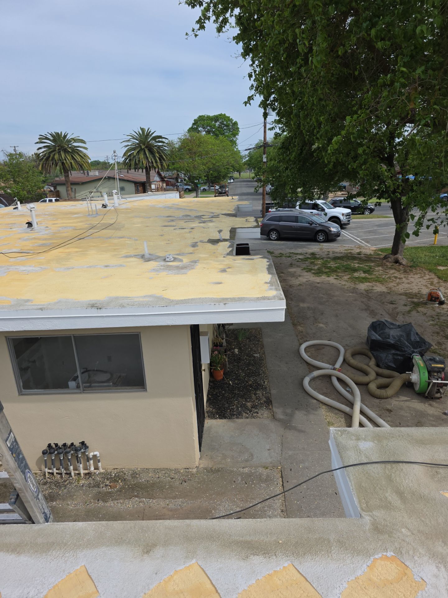 Foam Refurbish using Conklin Benchmark/PUMA XL coatings and spray foam by Straight Edge Roofing Inc