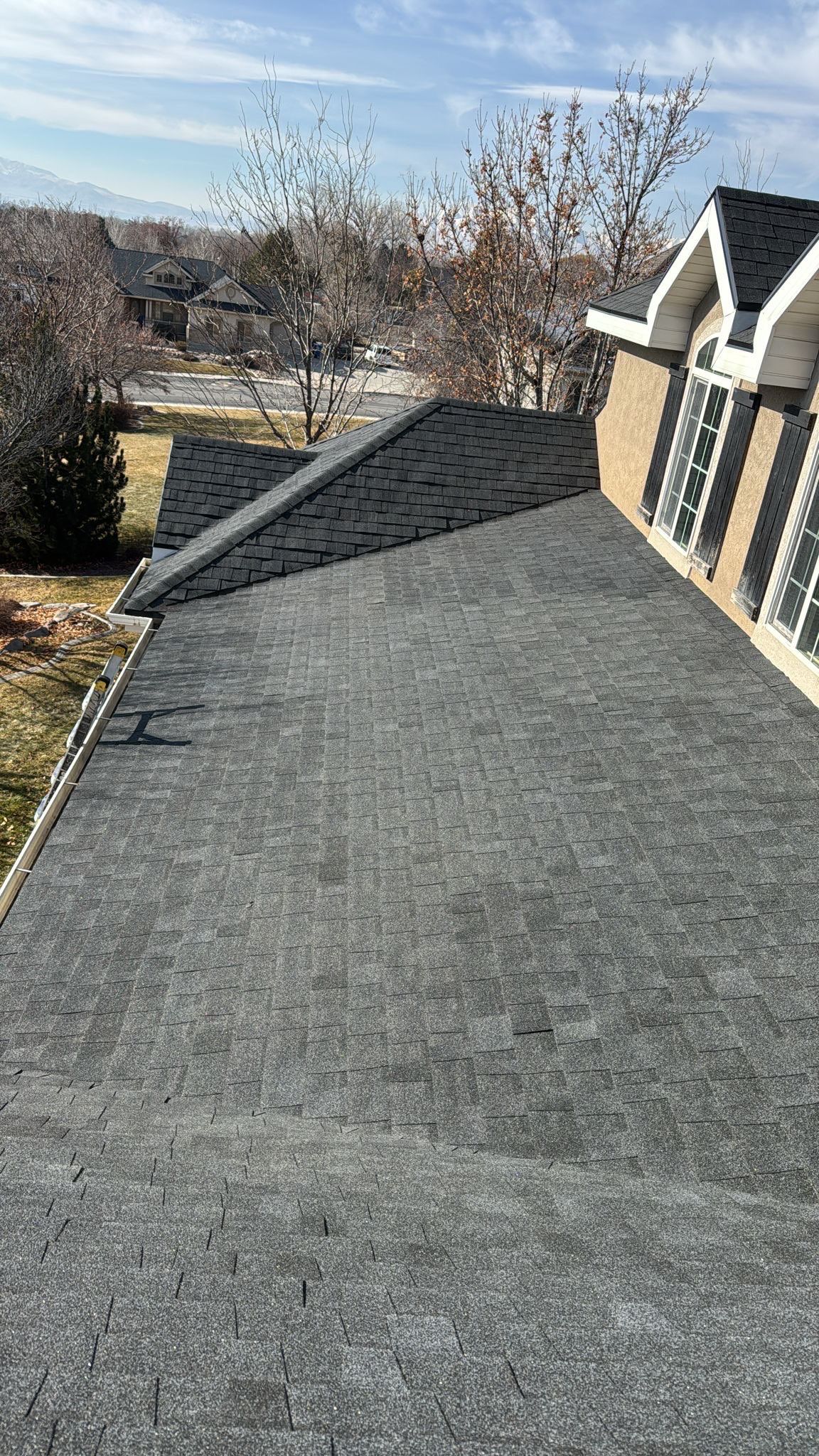 Charcoal Gray Shingles by Reimagine Roofing