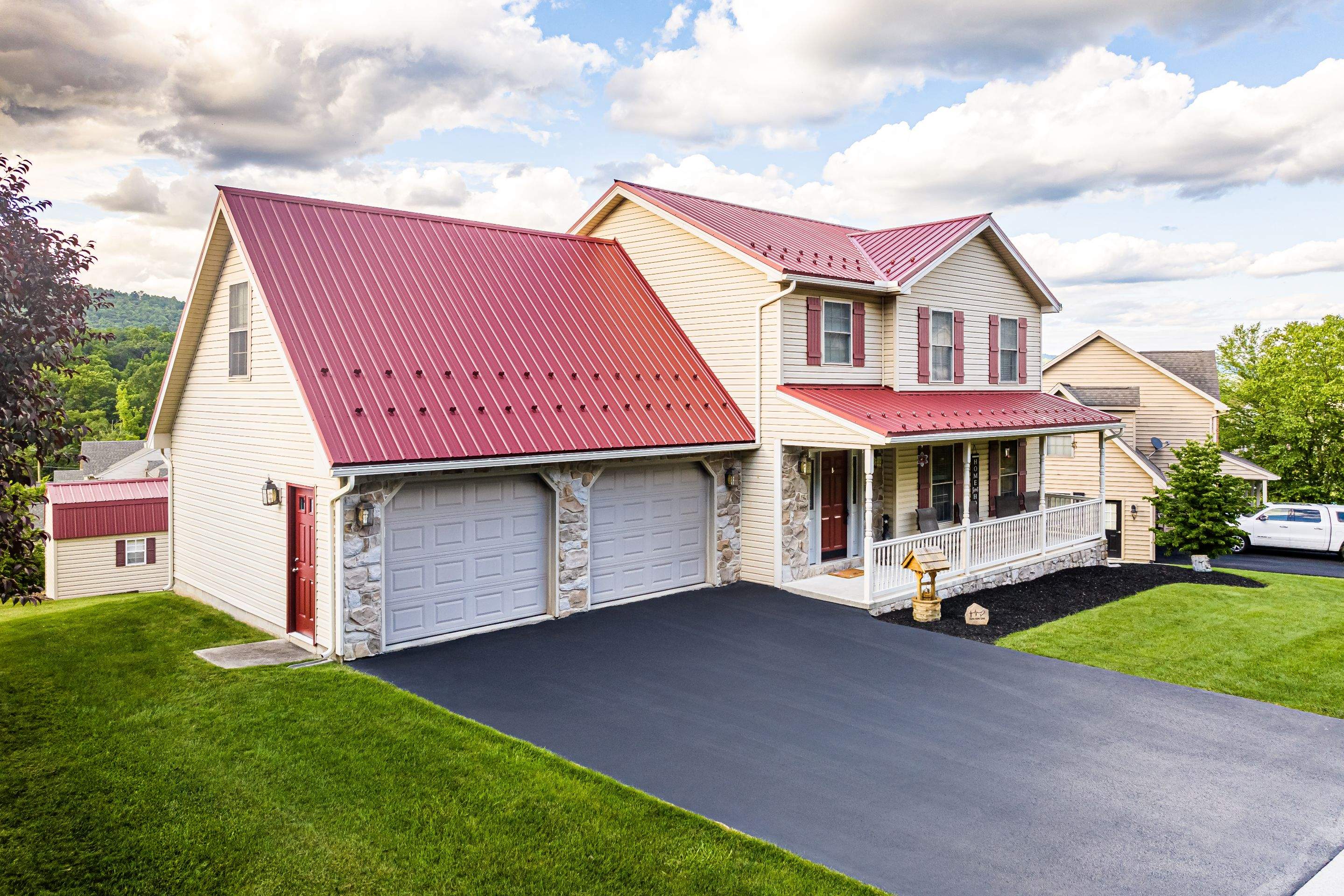 Metal roof-colonial red by Esh Builders