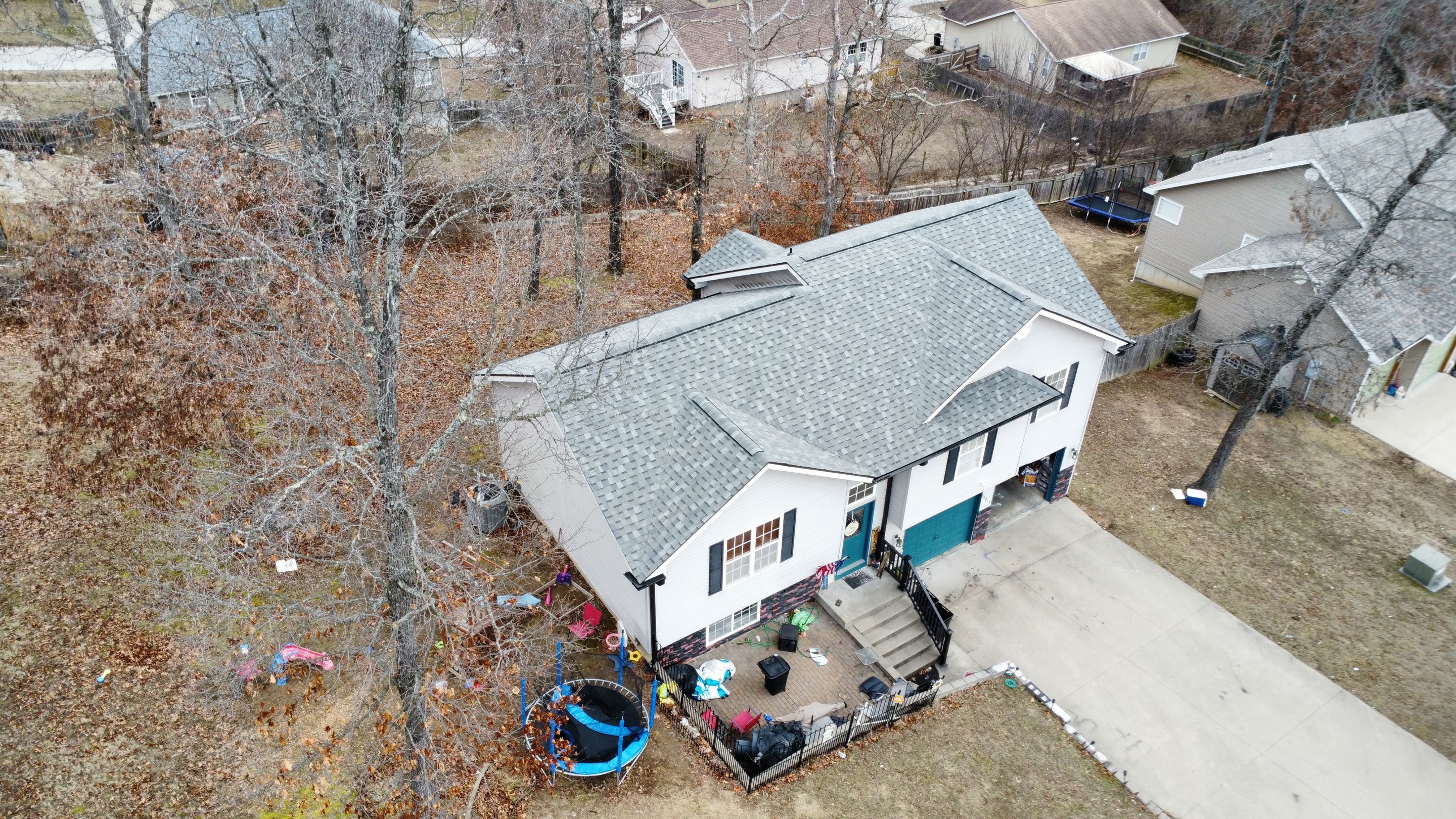 Residential Roof + Gutters & Downspouts Install  by Titan Commercial & Residential Roofing 
