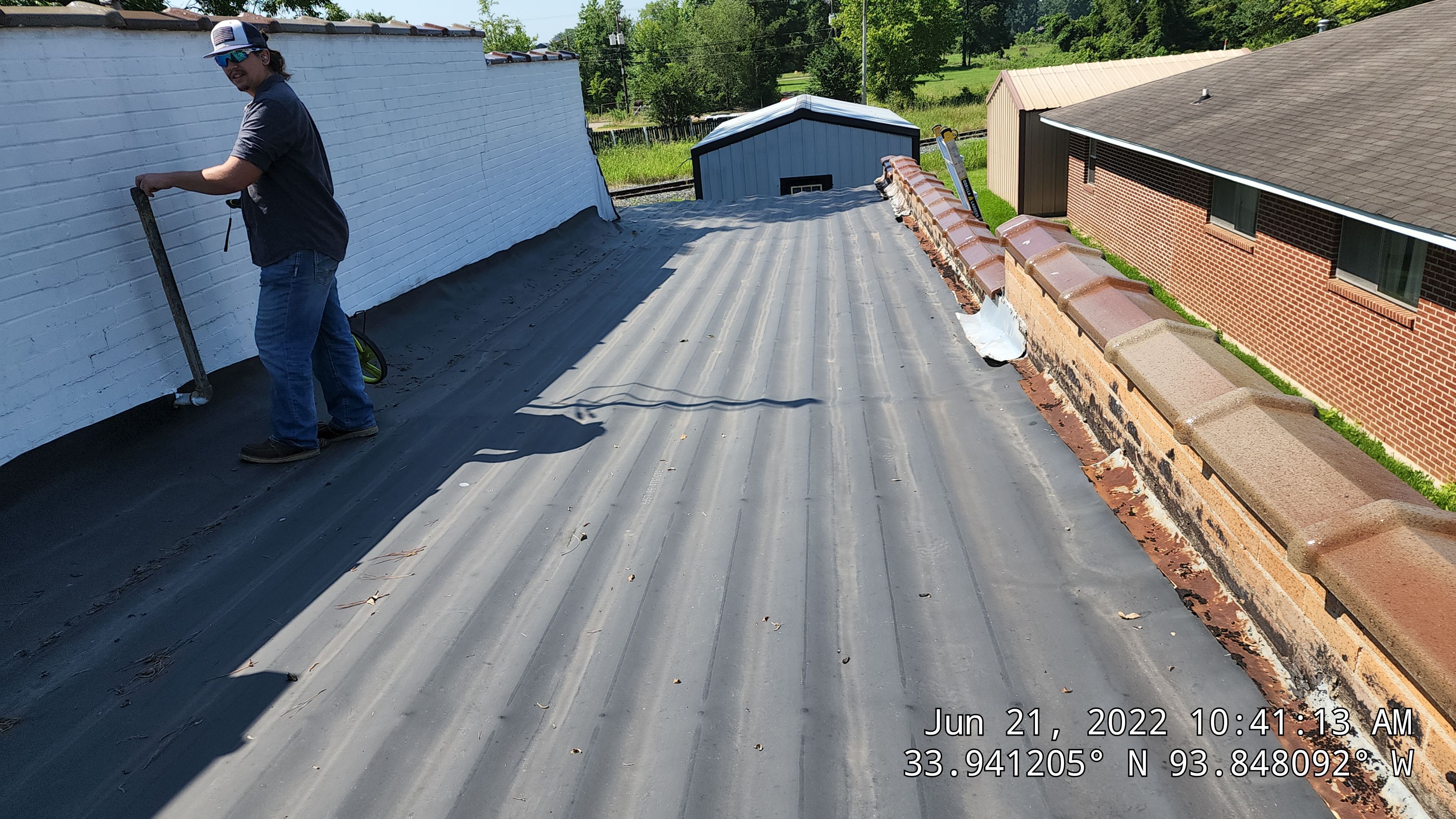 Commercial Roofing Installation using Aldocoat Coatings by Hostetler Roofing