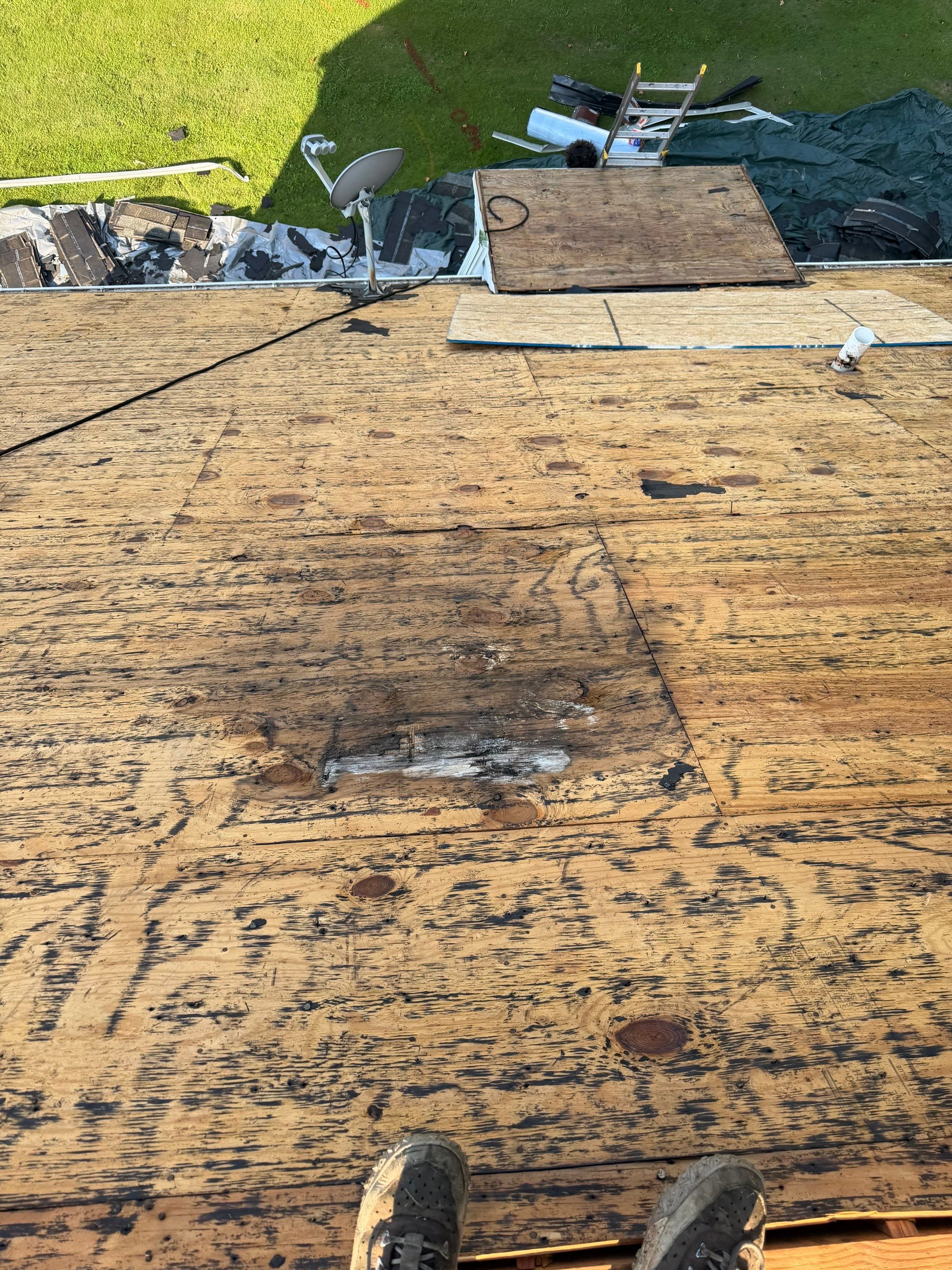 Asphalt Shingle Roof Replacement and Custom Porch Renovation in Hayes by Cade Construction