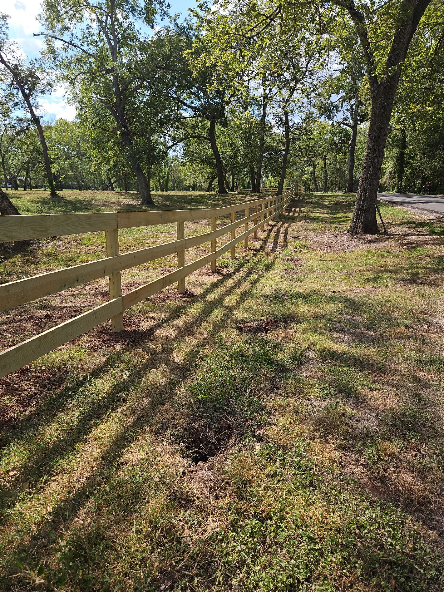 Ranch Style fence Plus Iron installation by Tim's Fences