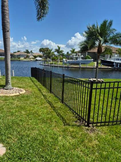 Custom Black Aluminum Fence Enclosure for Punta Gorda Waterfront Property by True Fence LLC