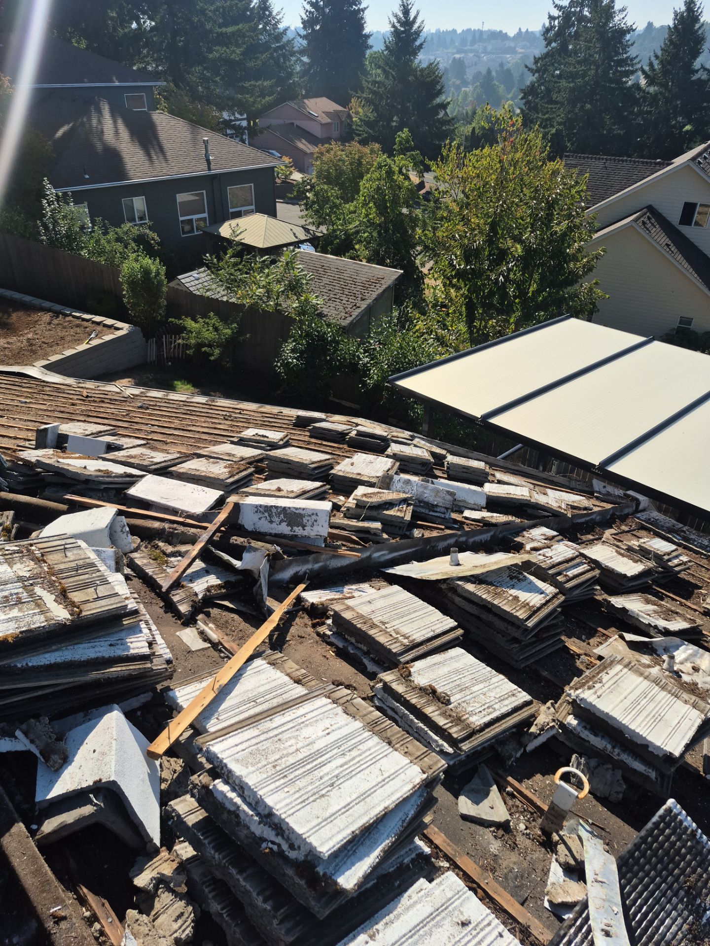 Granite Black Residential Roof Replacement by Orezona Building & Roofing Company, Inc.
