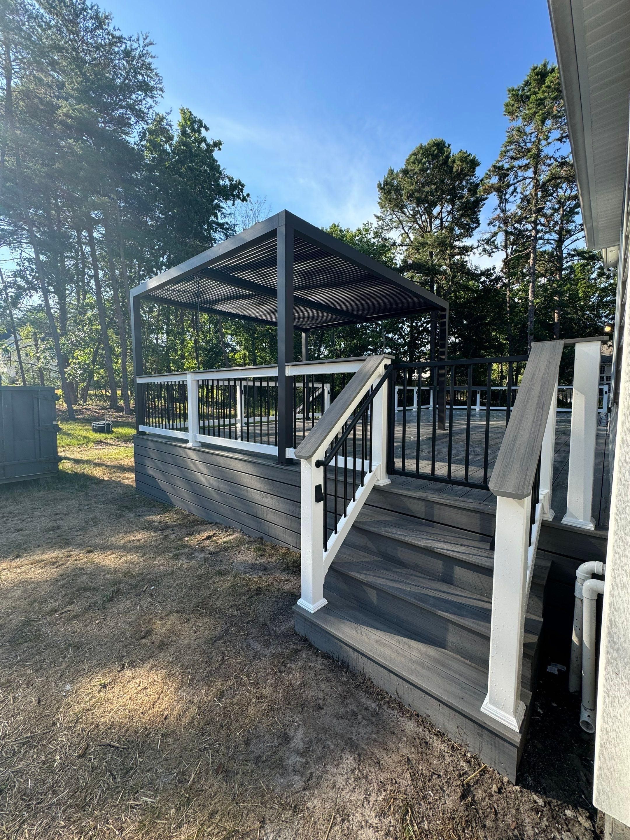 New Deck with Manual Louvered Pergola by deck guardian