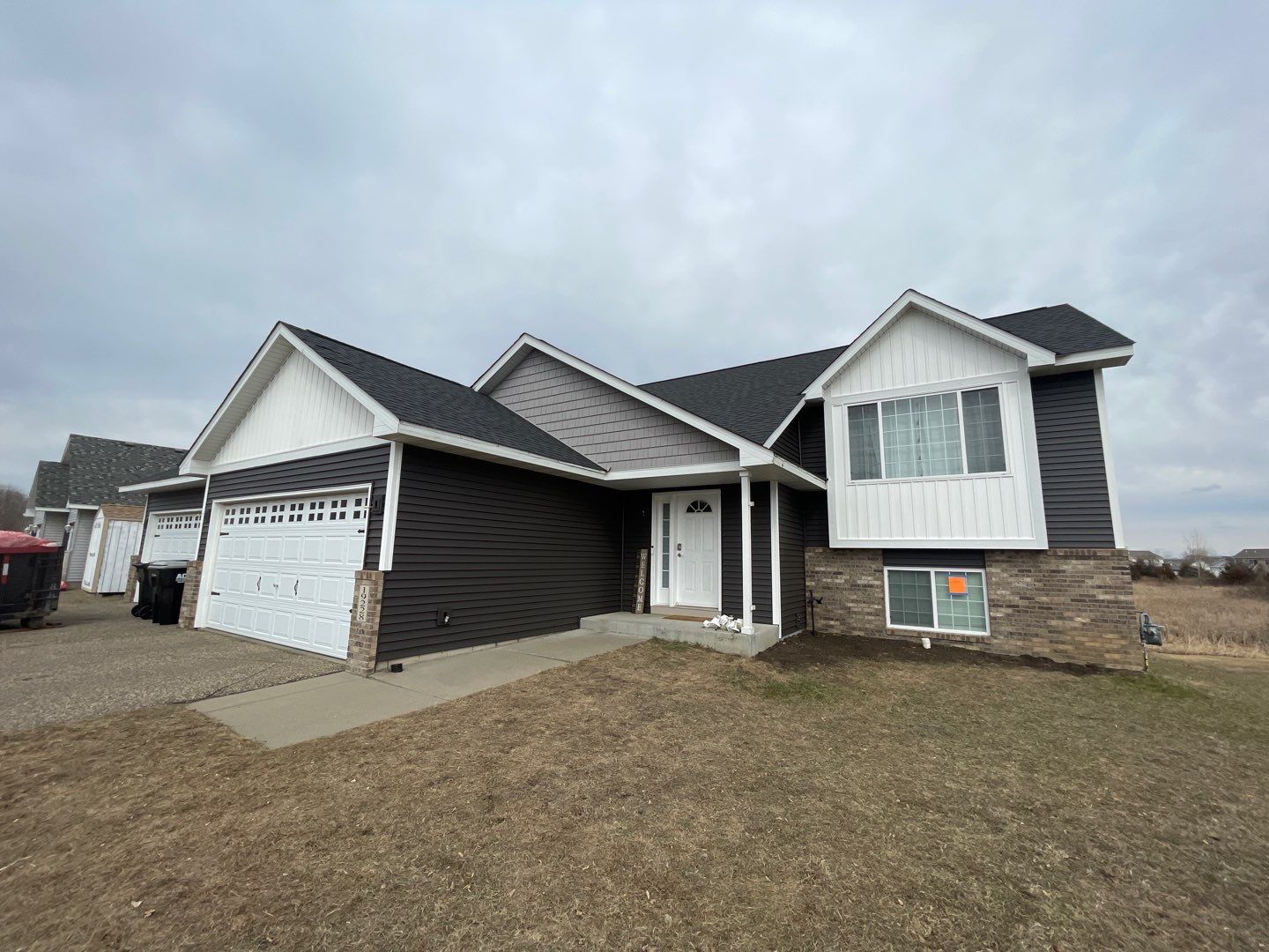 CertainTeed Landmark Roof, Mastic Siding & Edco Gutters | Insurance Approved | Big Lake, MN by First Impressions Exteriors